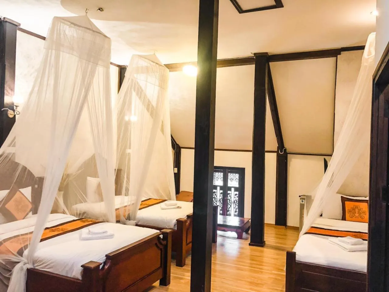 Photo of the whole room, Bed in Ananta Hotel Luangprabang