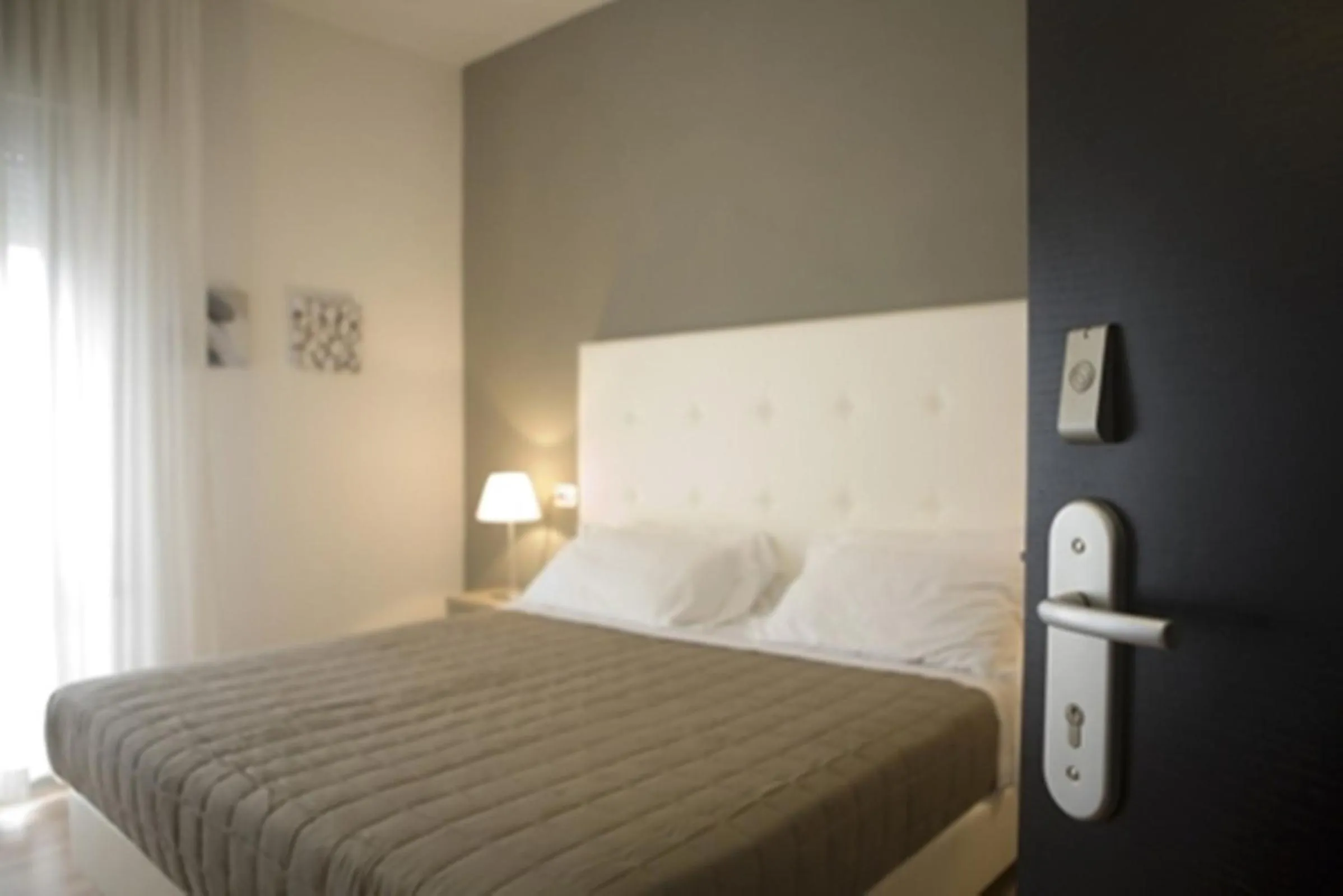 Bed in Hotel Tiffany & Resort