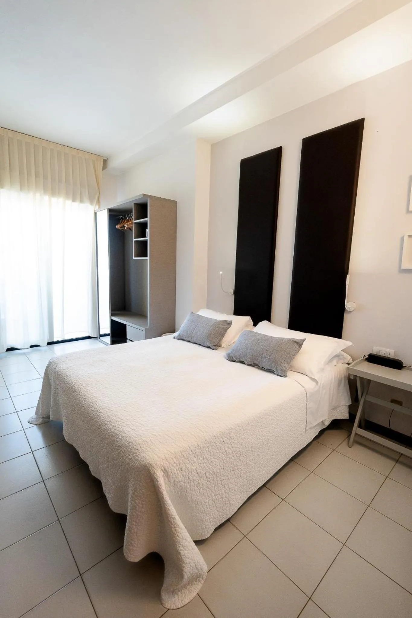 Bed in Hotel Tiffany & Resort