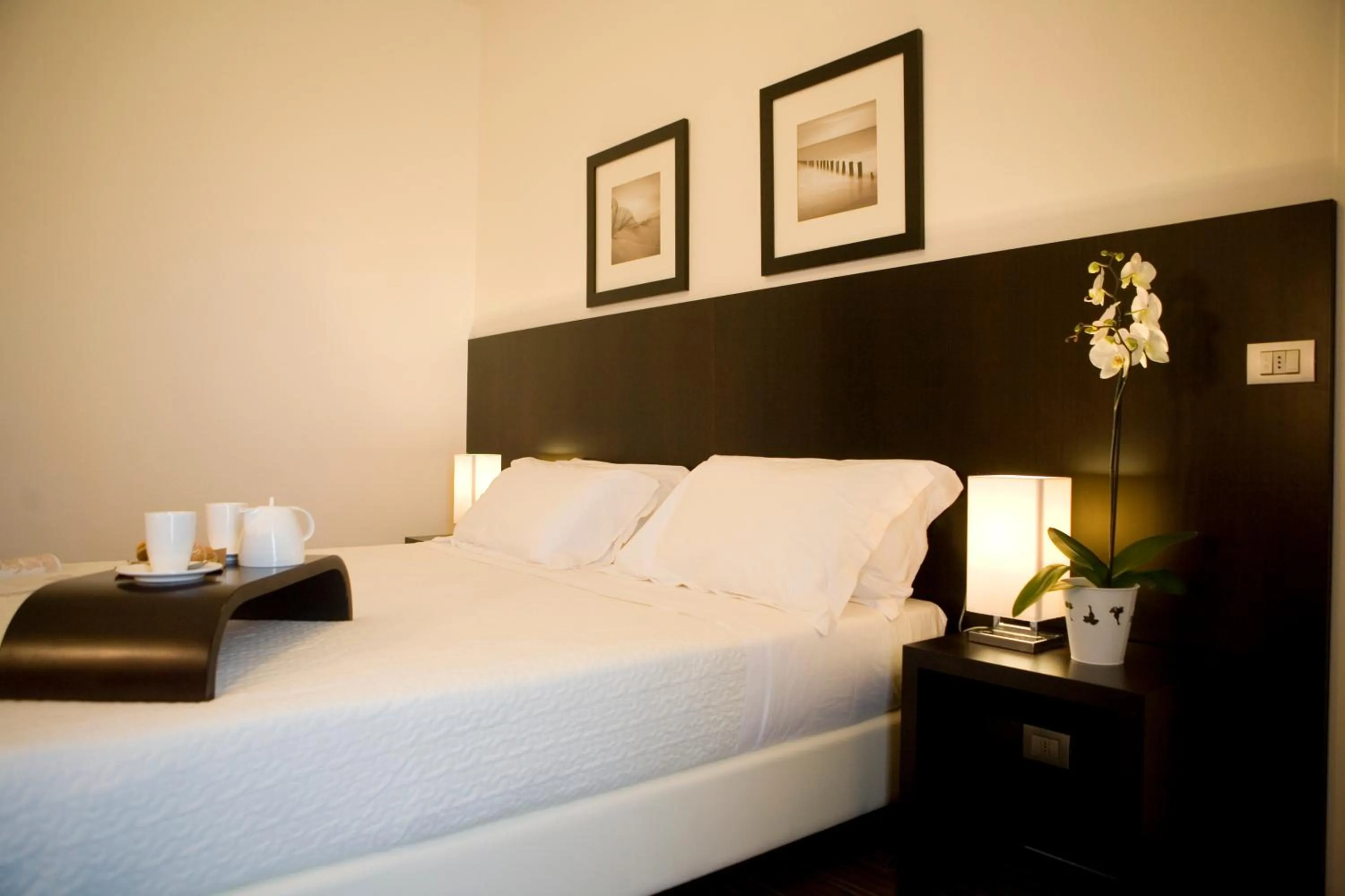 Bed in Hotel Tiffany & Resort