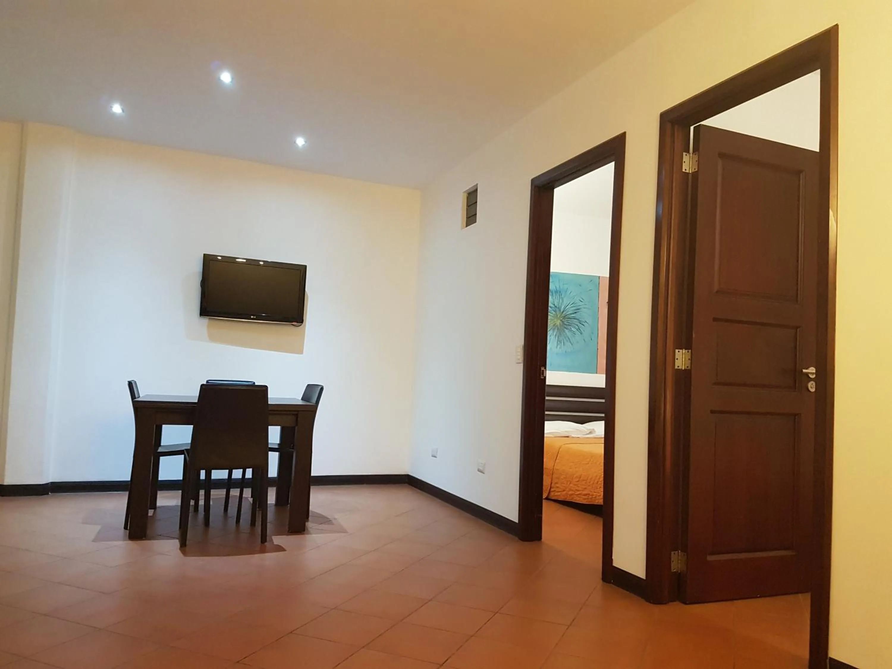 Dining area, Bed in Hotel RDG