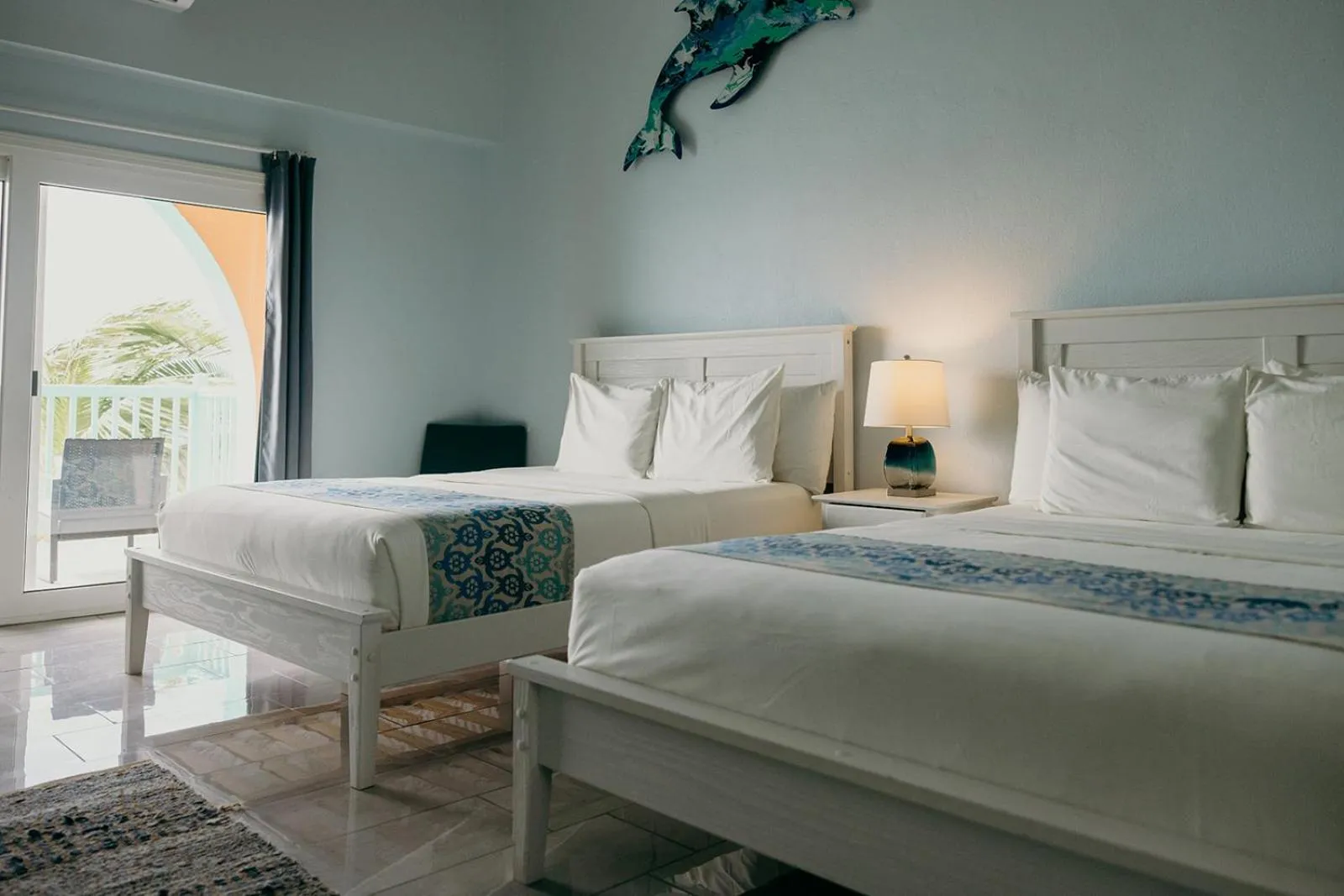 Bed in Grapetree Bay Hotel and Villas
