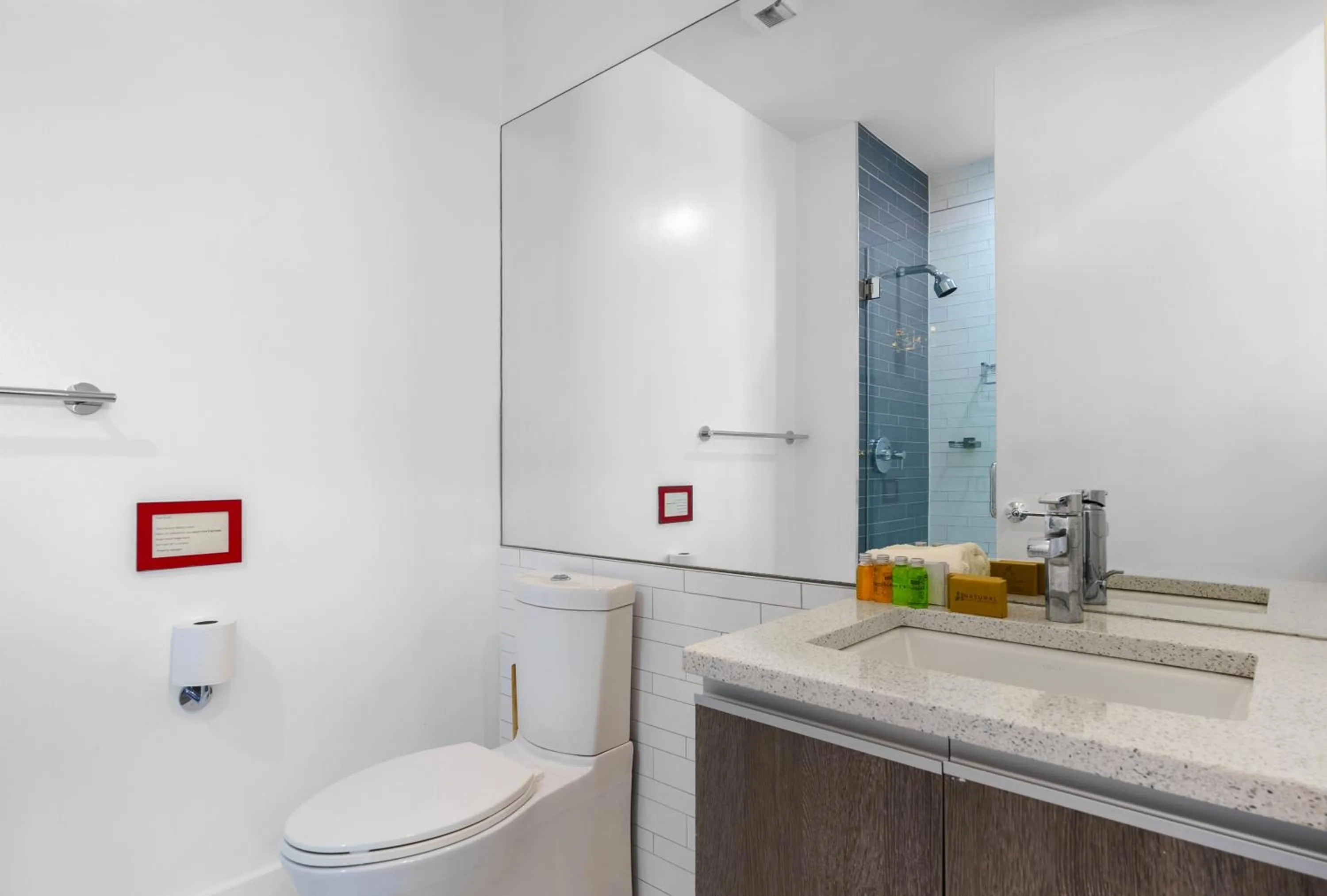 Toilet in Dharma Home Suites Hoboken