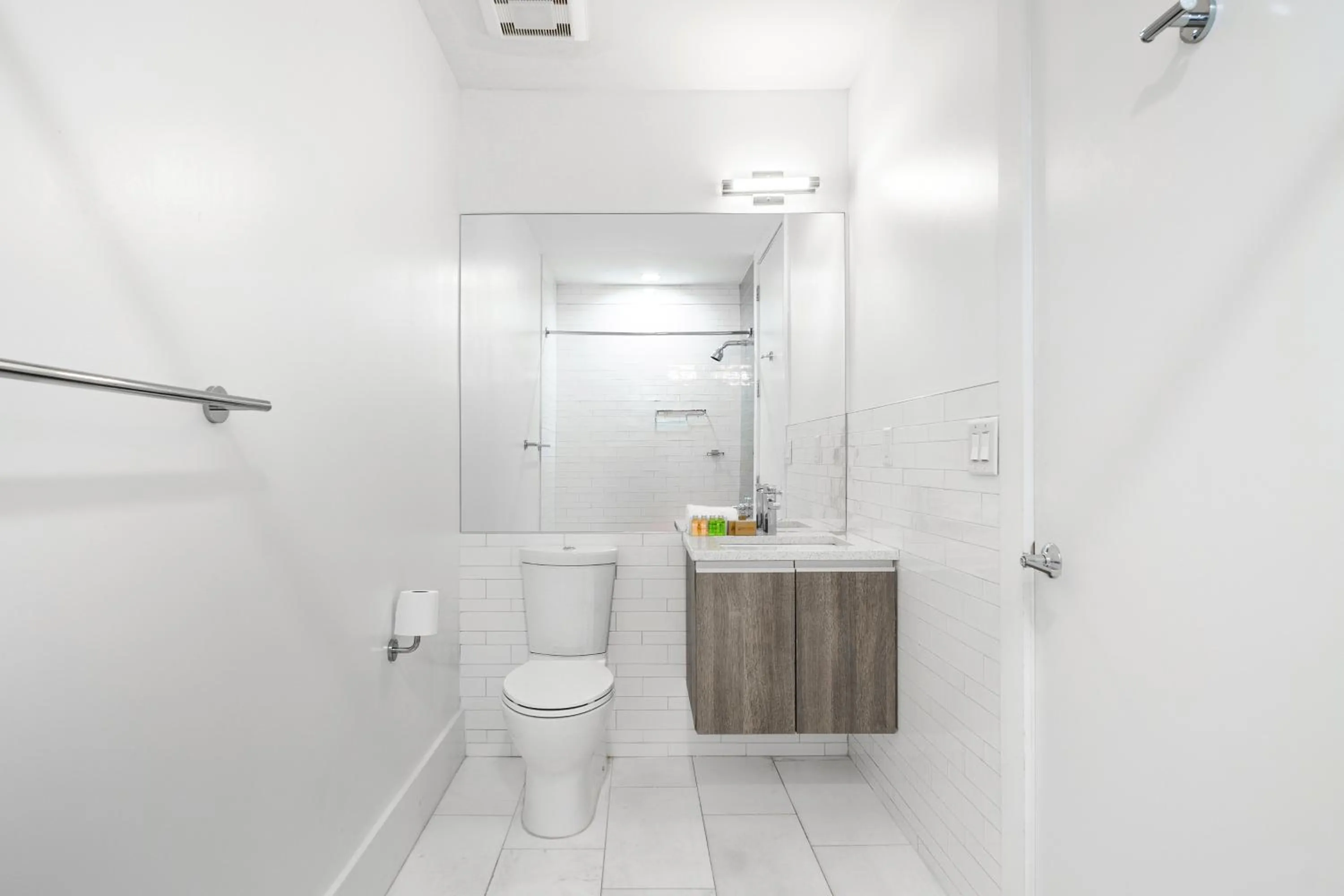 Toilet in Dharma Home Suites Hoboken