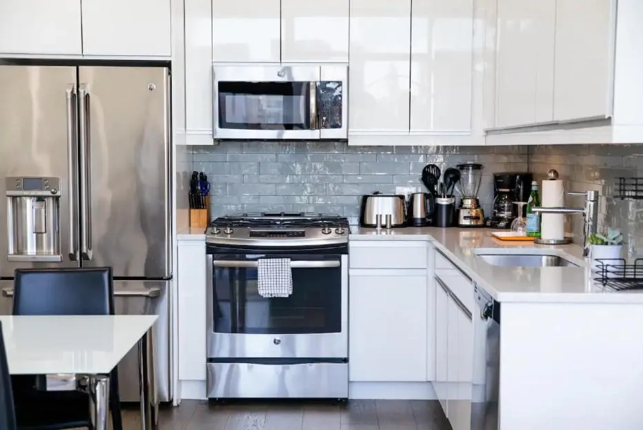 kitchen in Dharma Home Suites Hoboken