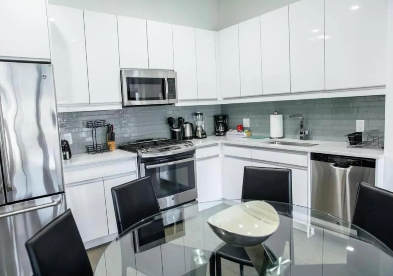 kitchen in Dharma Home Suites Hoboken