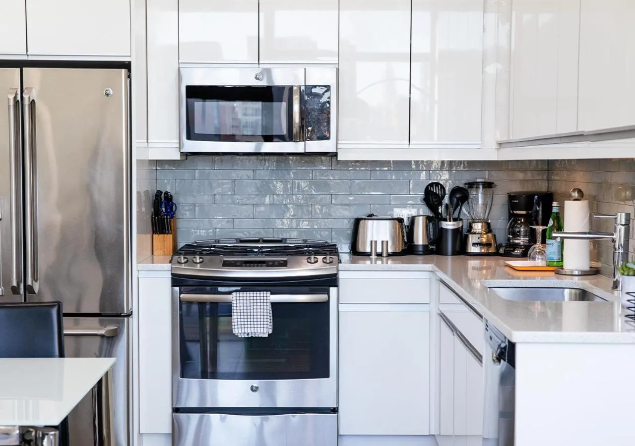 kitchen in Dharma Home Suites Hoboken