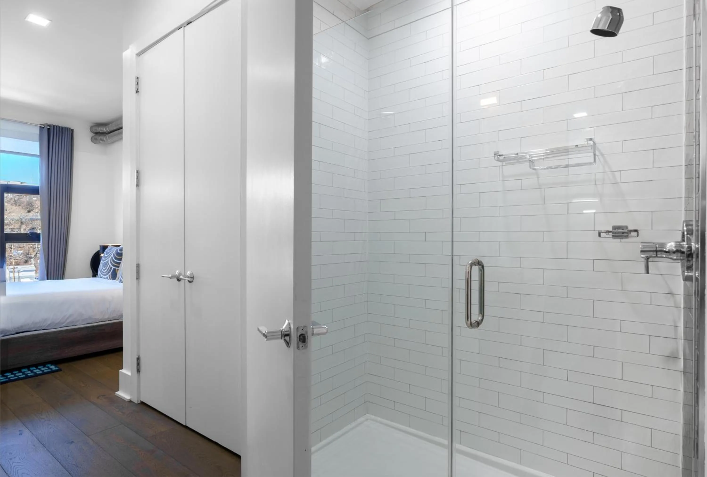 Shower, Bed in Dharma Home Suites Hoboken