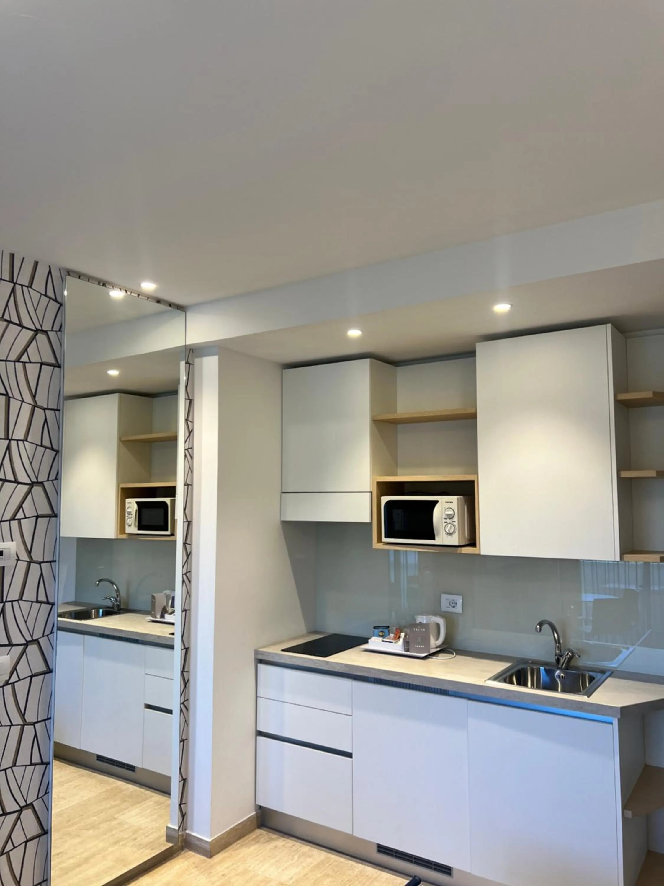 Kitchen or kitchenette in Astoria Suite Hotel