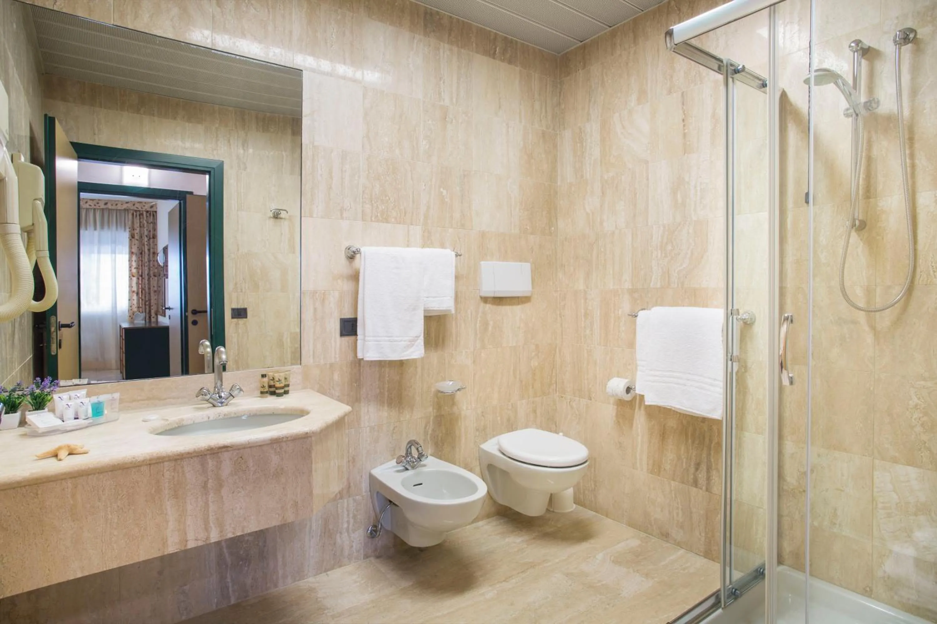 Bathroom in Astoria Suite Hotel