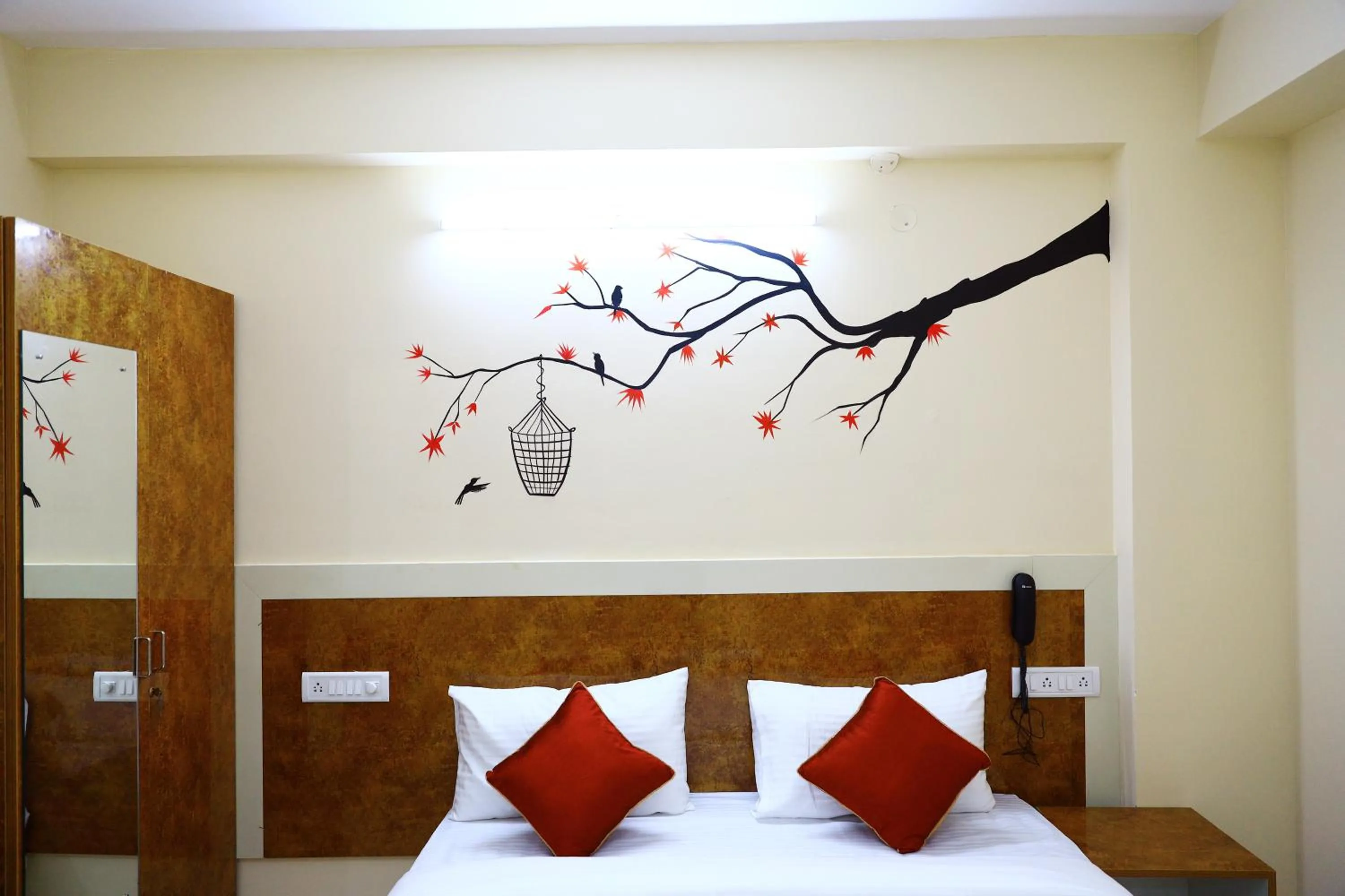 Bed in Sasthi Suites