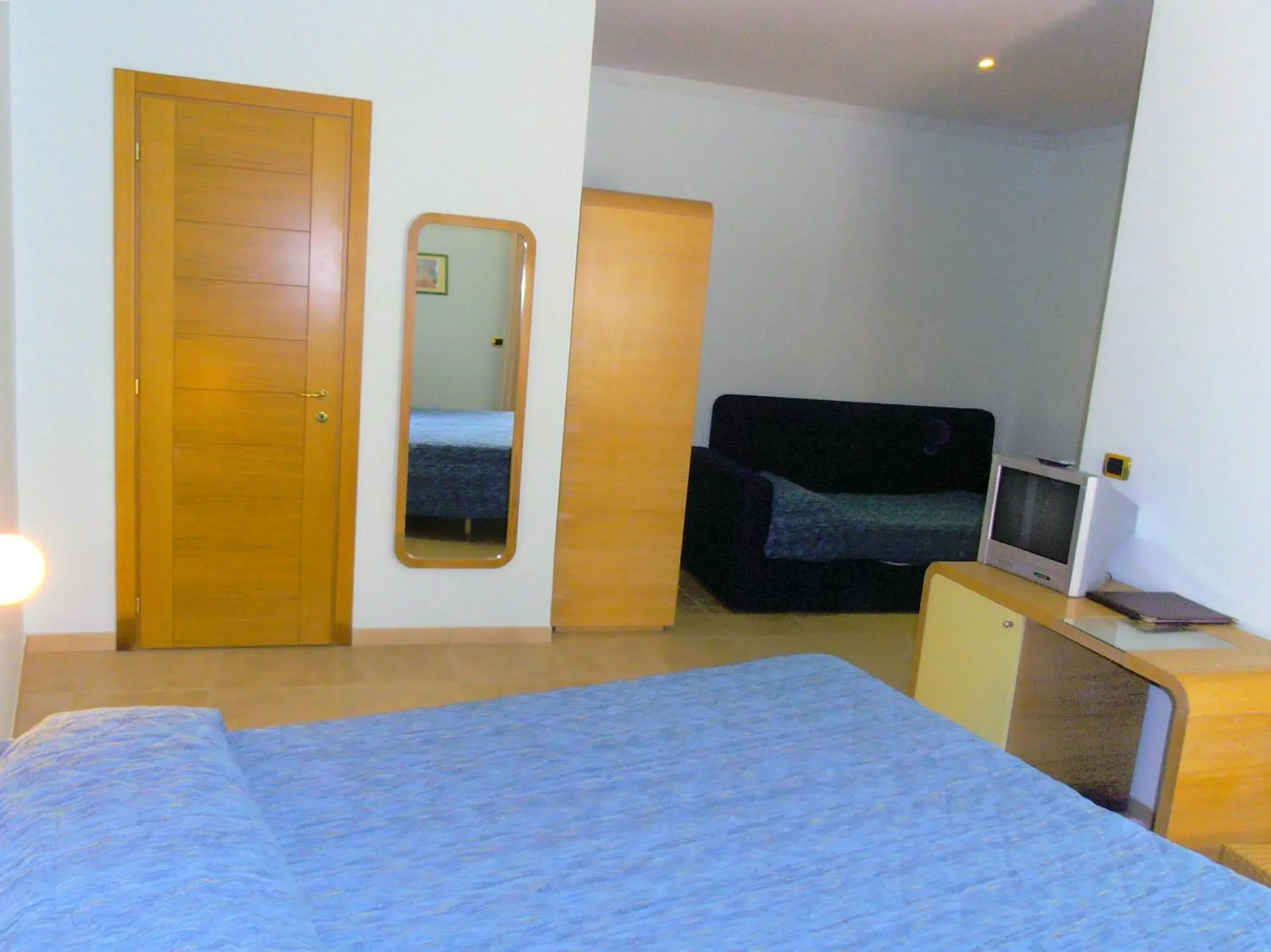 Triple Room in Hotel Villa Carolina Triple Room in Hotel Villa Carolina