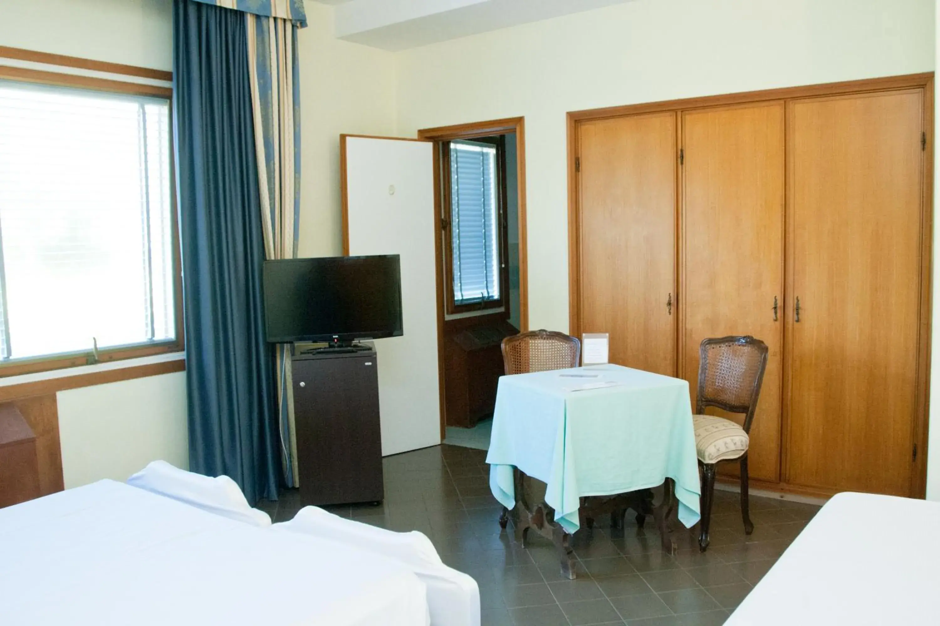 Standard Triple Room in Hotel Ristorante Maga Circe Standard Triple Room in Hotel Ristorante Maga Circe