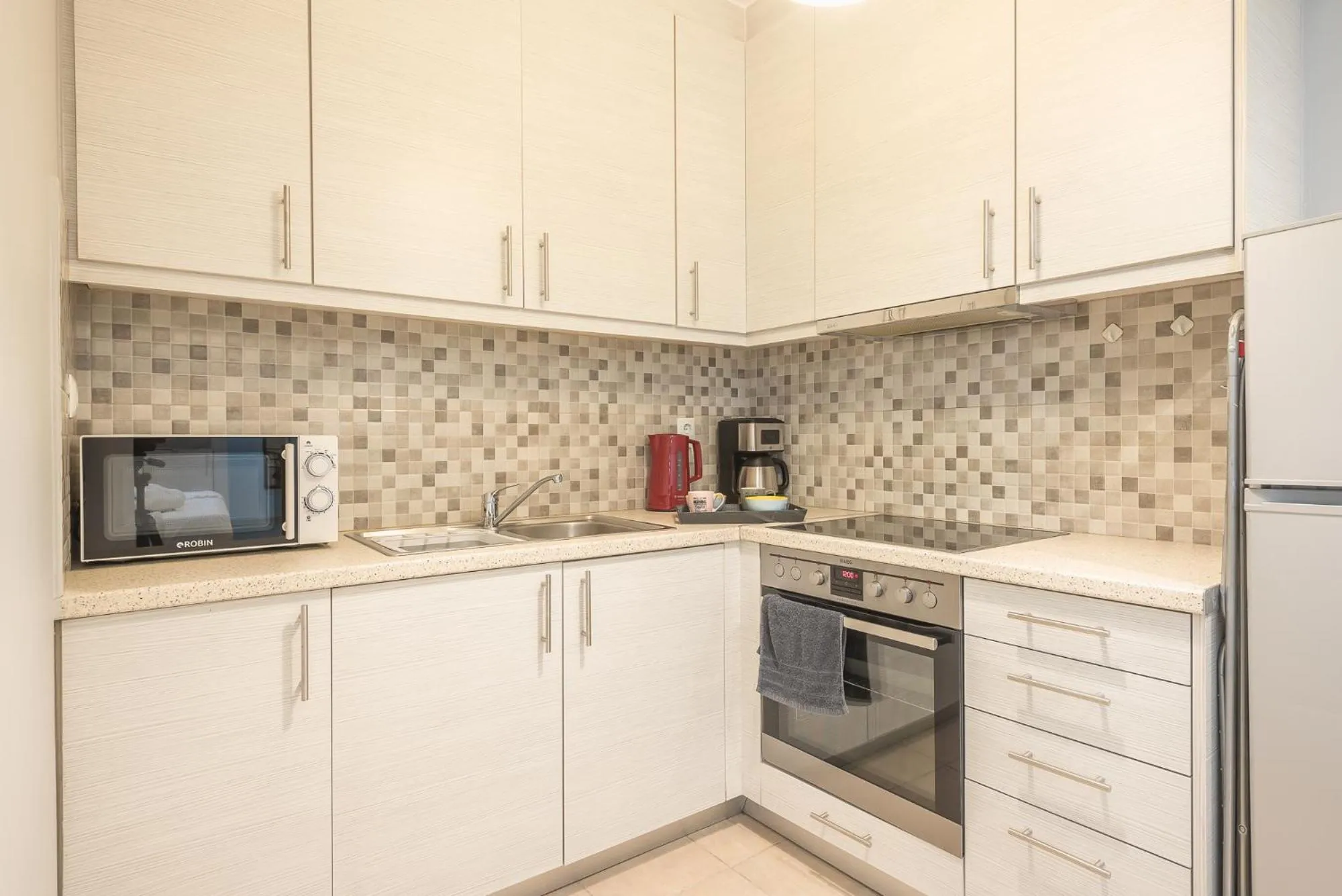 Kitchen or kitchenette in The Boutique Studio by CloudKeys