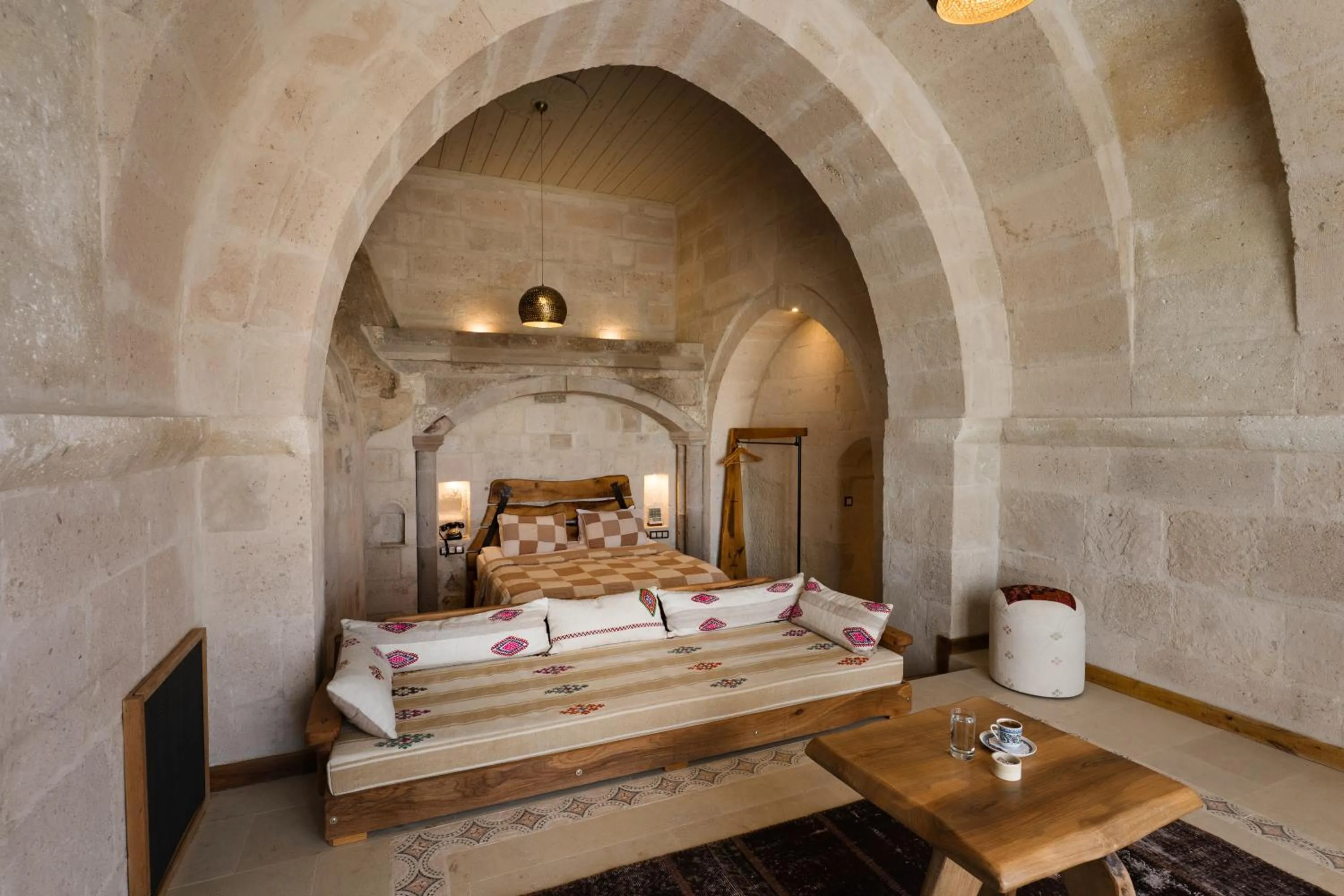 Seating area, Bed in Cappadocia Cave Suites Adult Only