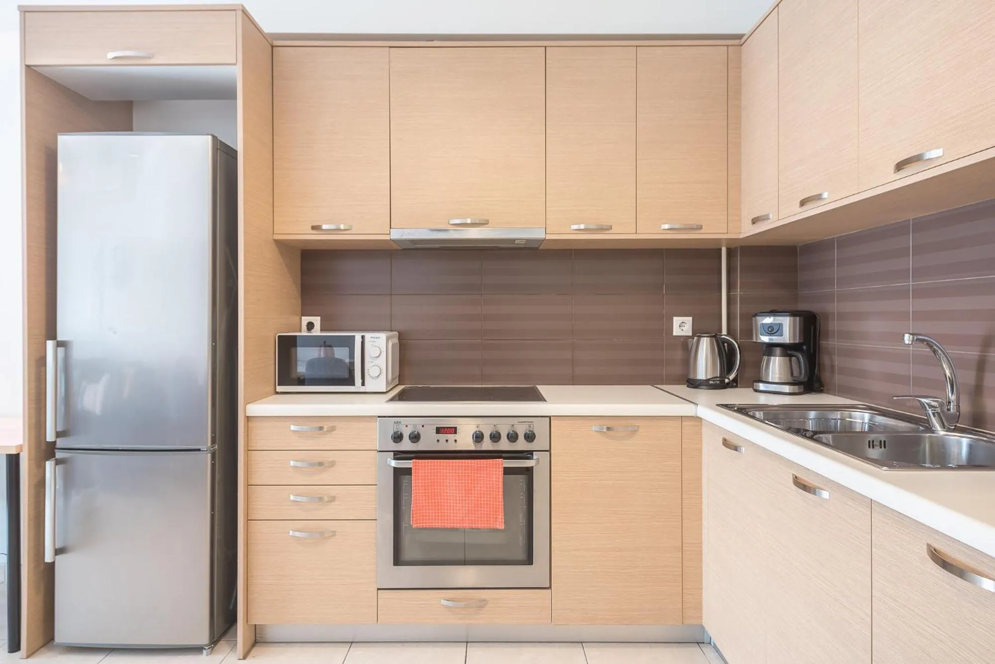 Coffee/tea facilities in Elegant Home with Balcony by CloudKeys