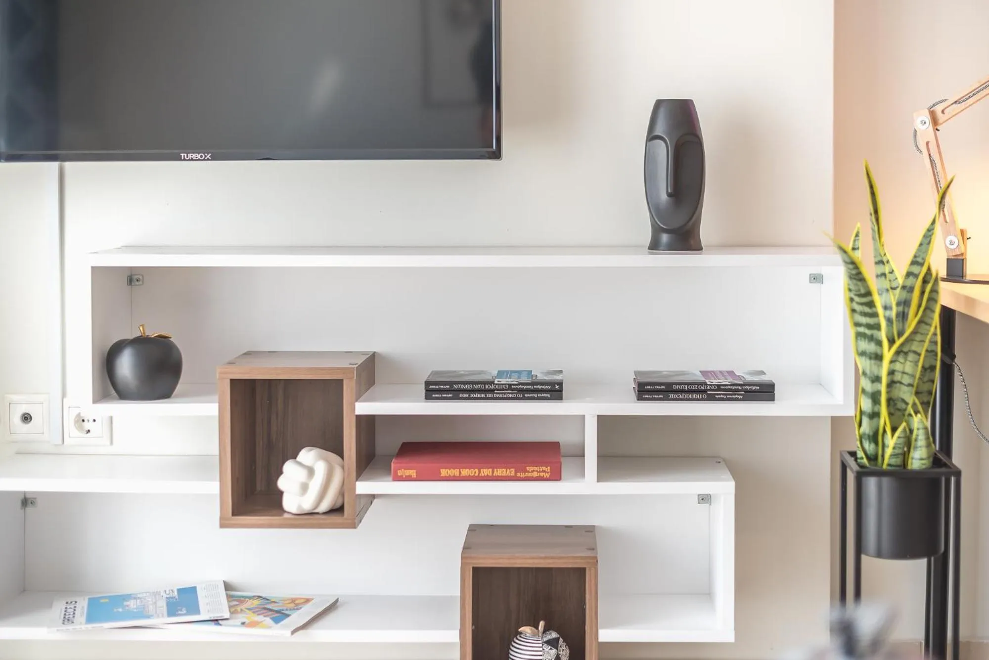 TV and multimedia in Elegant Home with Balcony by CloudKeys