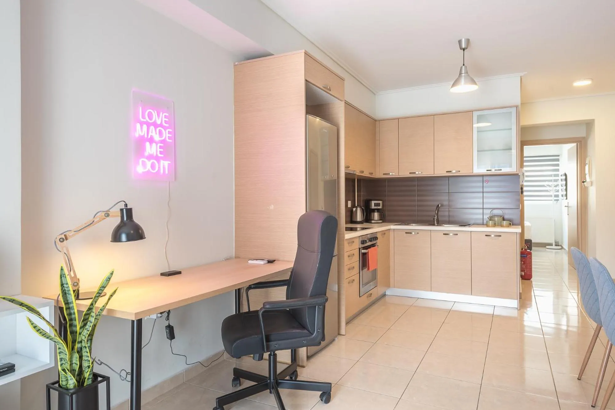 Kitchen or kitchenette in Elegant Home with Balcony by CloudKeys