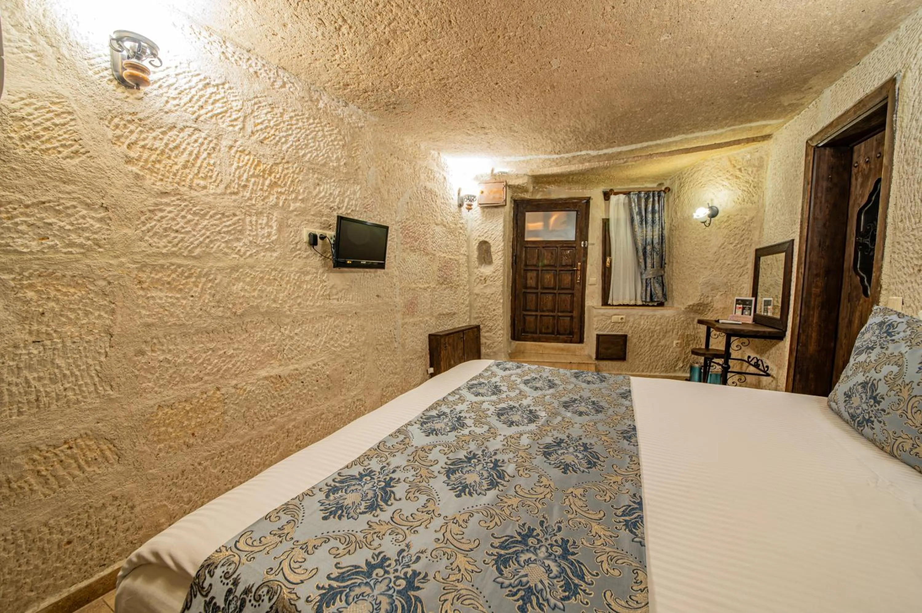 Bed in Ascension Cave Suites - Special Class