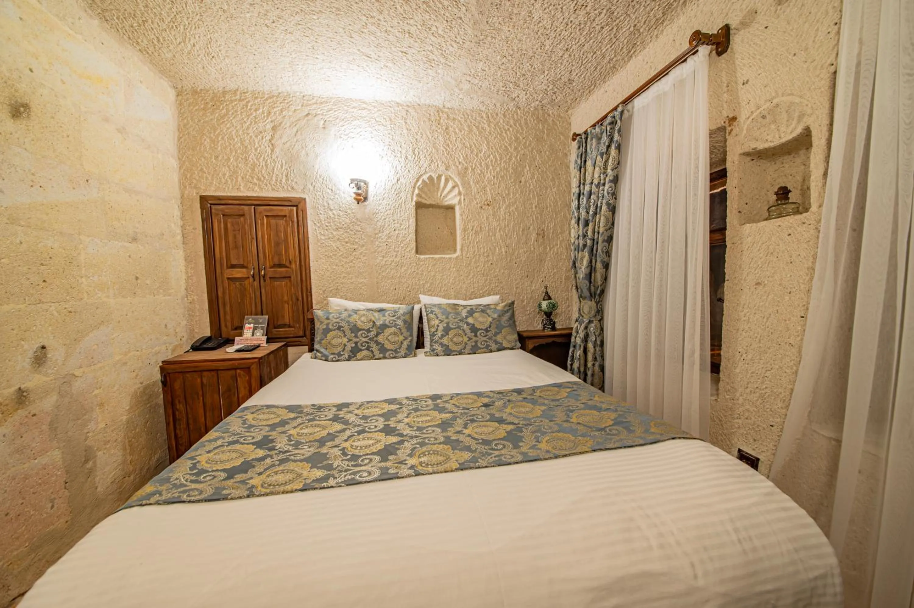 Bed in Ascension Cave Suites - Special Class