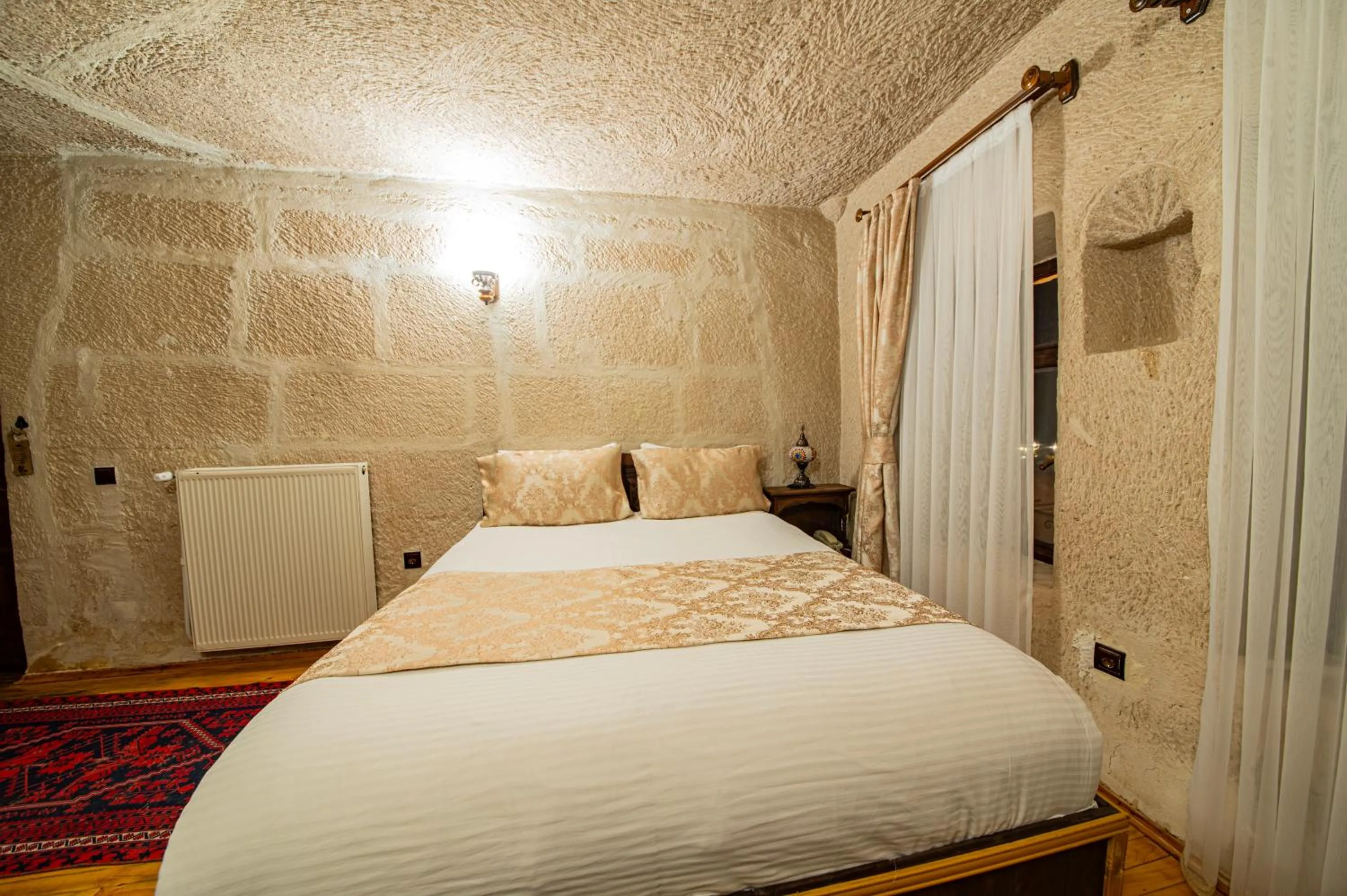 Bed in Ascension Cave Suites - Special Class