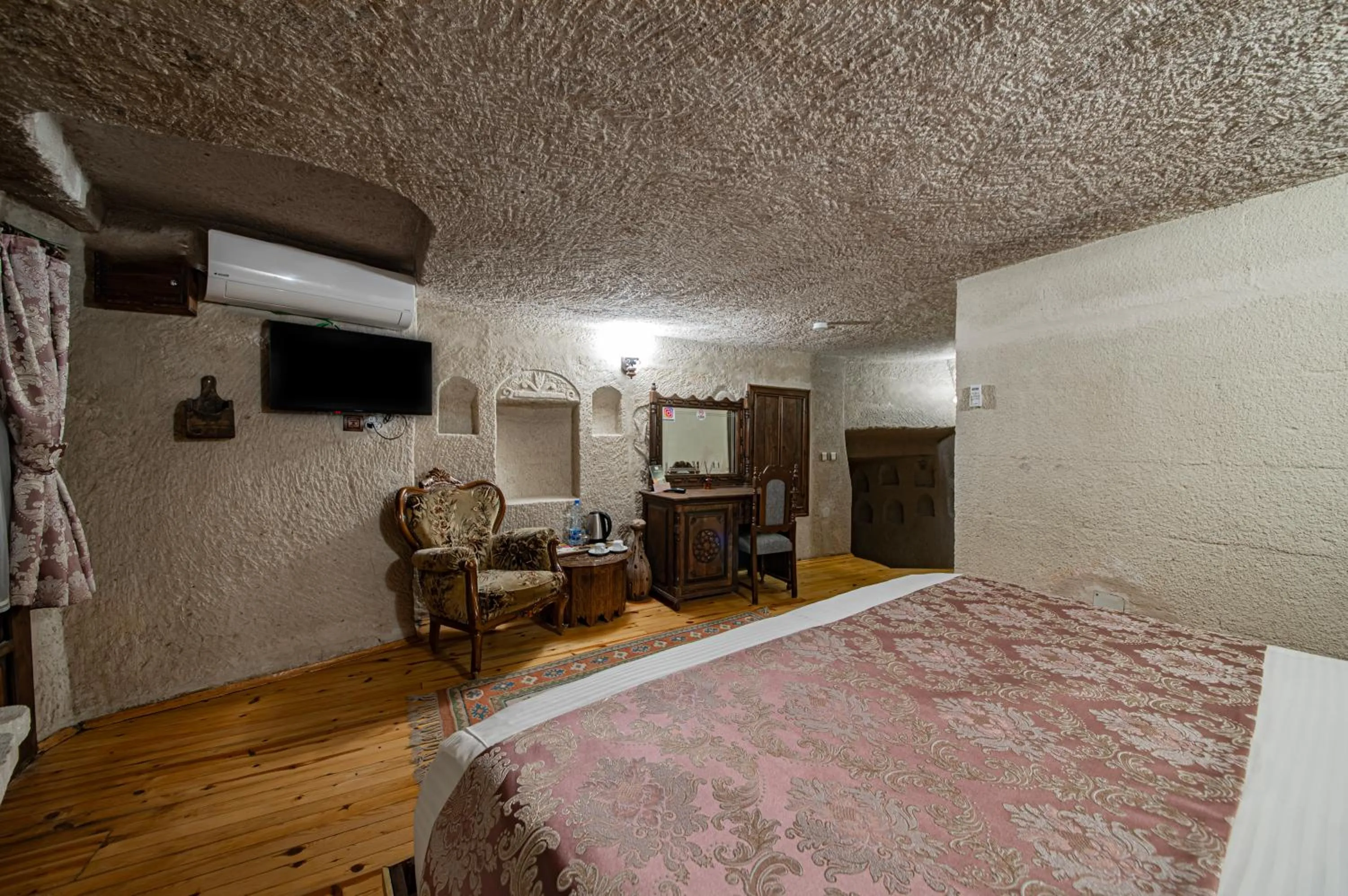 Bed in Ascension Cave Suites - Special Class