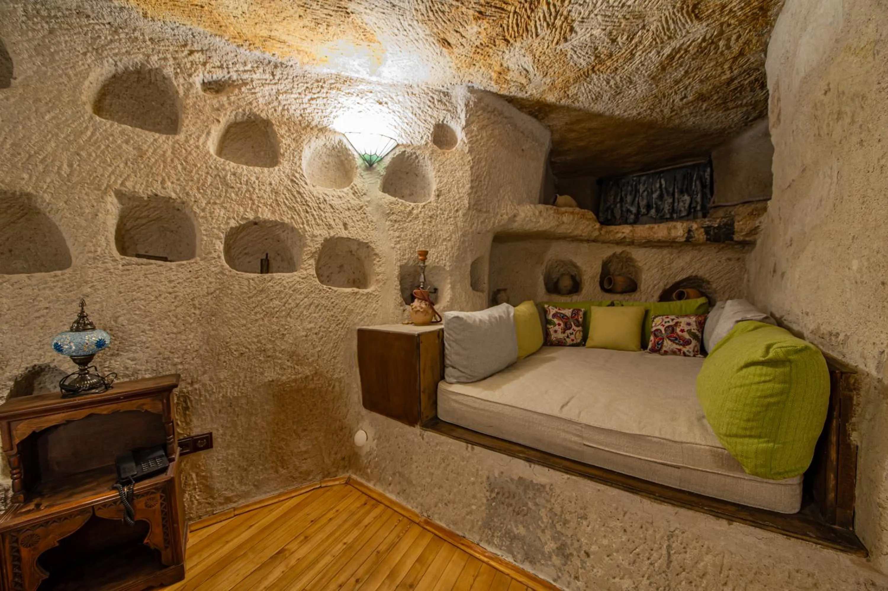 Seating area, Bed in Ascension Cave Suites - Special Class