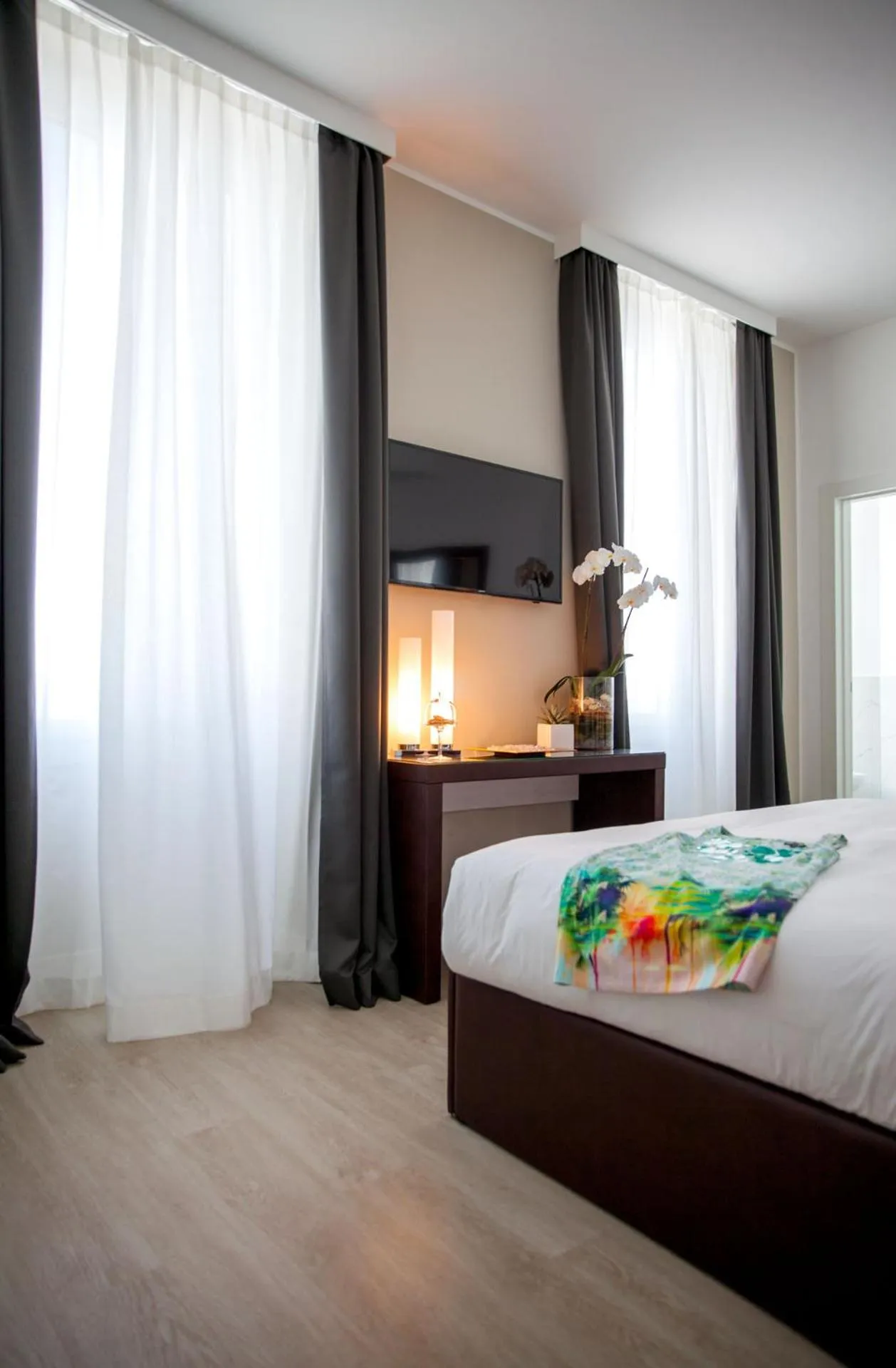 Bed in Sanremo Luxury Suites