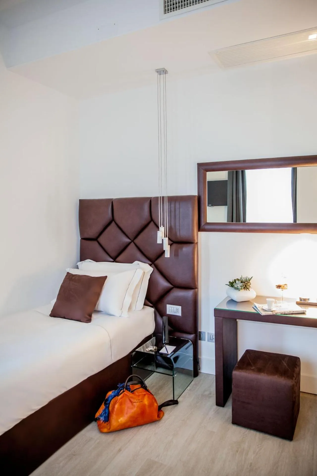 Bed in Sanremo Luxury Suites