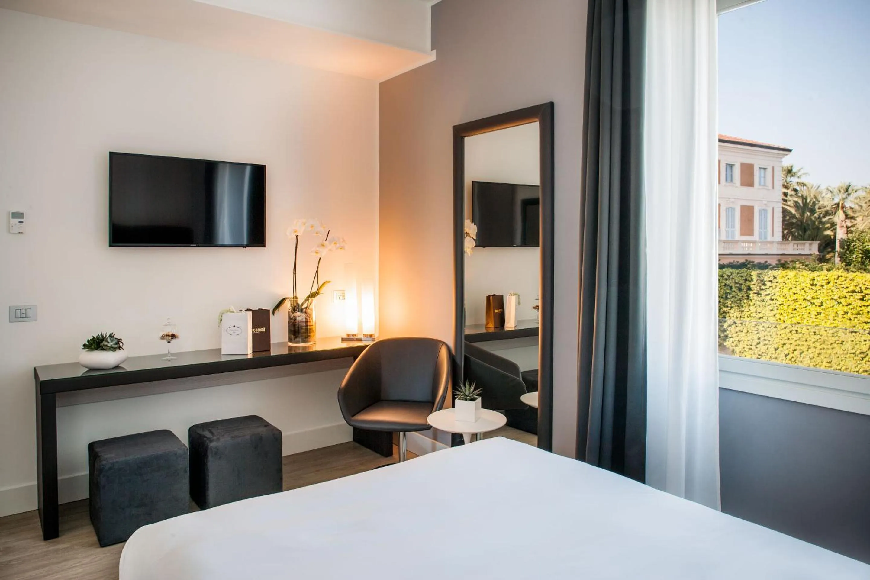 Bed in Sanremo Luxury Suites