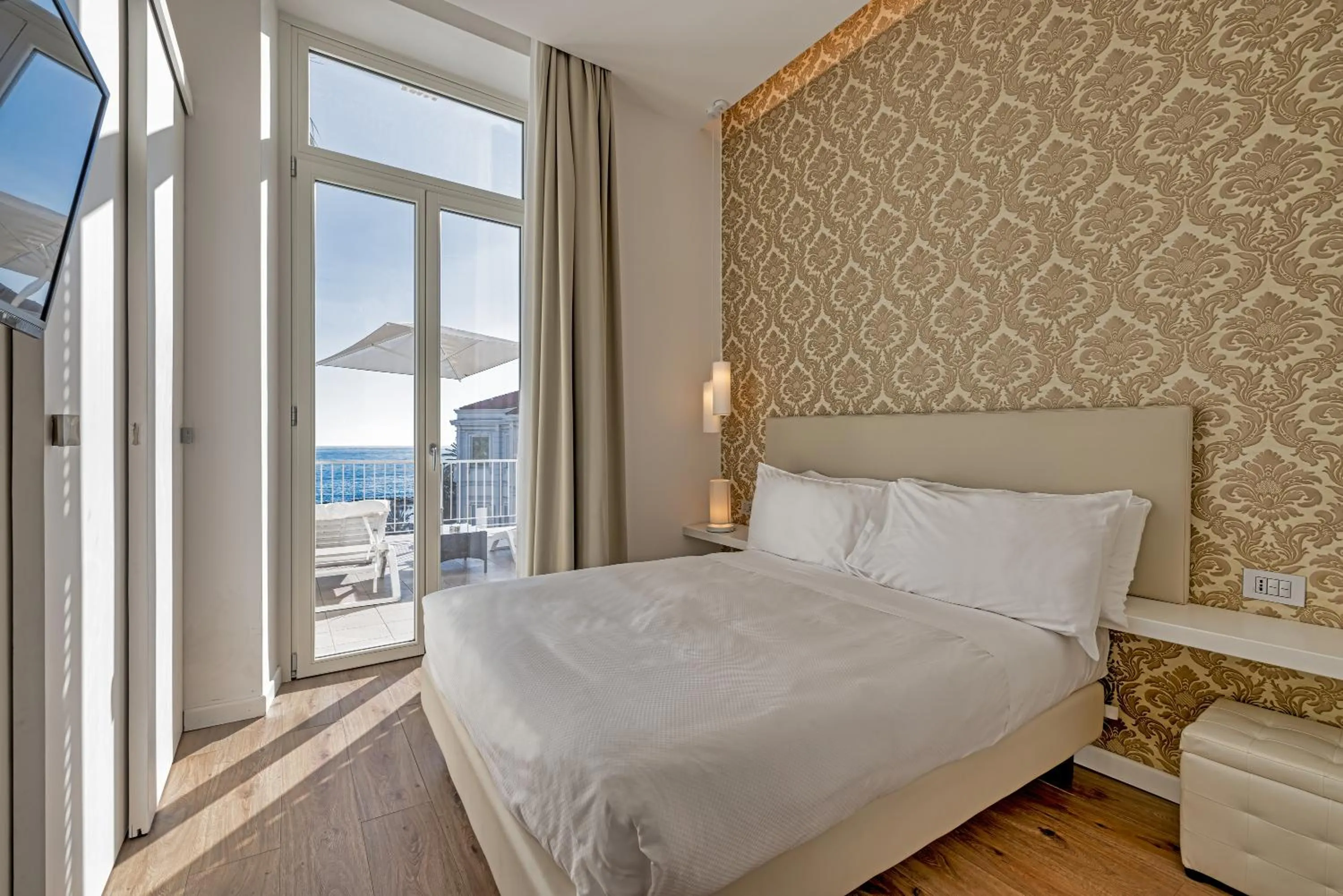 Bed in Sanremo Luxury Suites