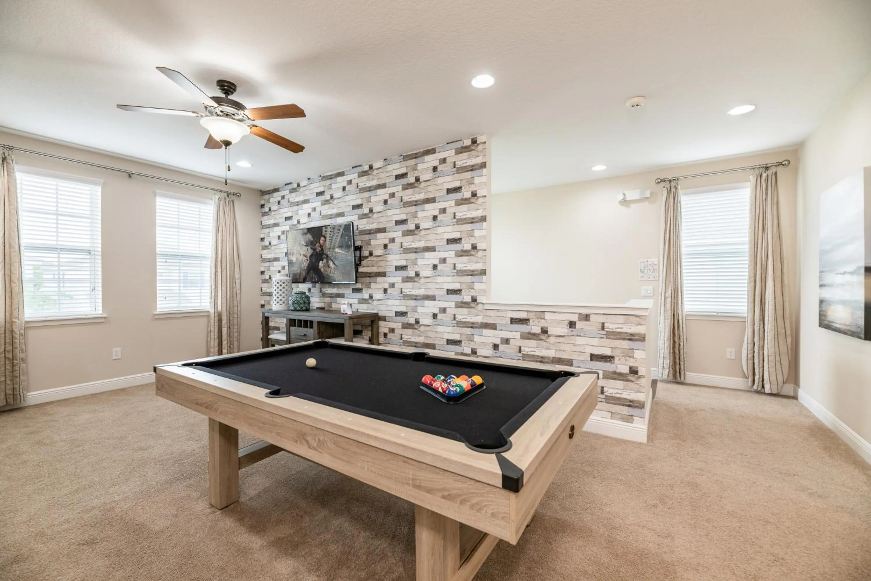 Communal lounge/ TV room in Encore Resort and Water Park at Reunion by Rentyl