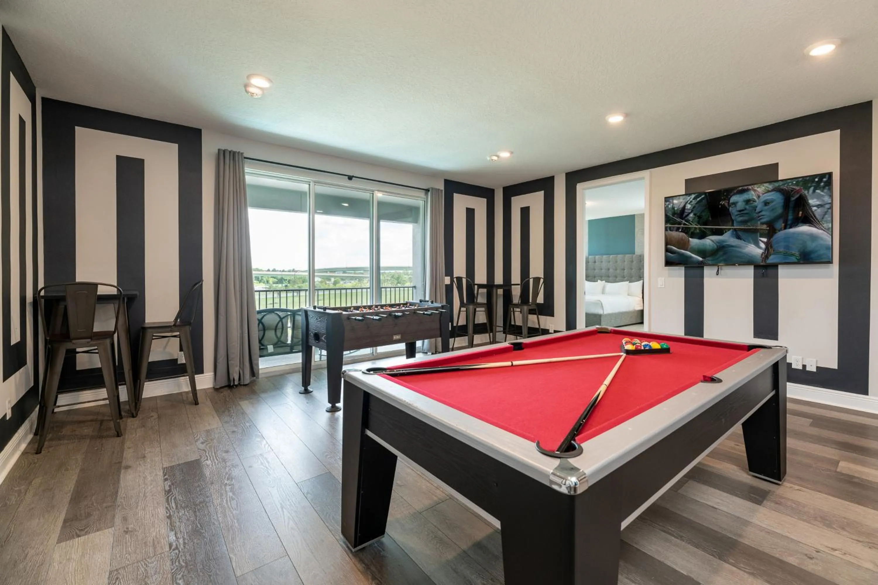 Communal lounge/ TV room in Encore Resort and Water Park at Reunion by Rentyl