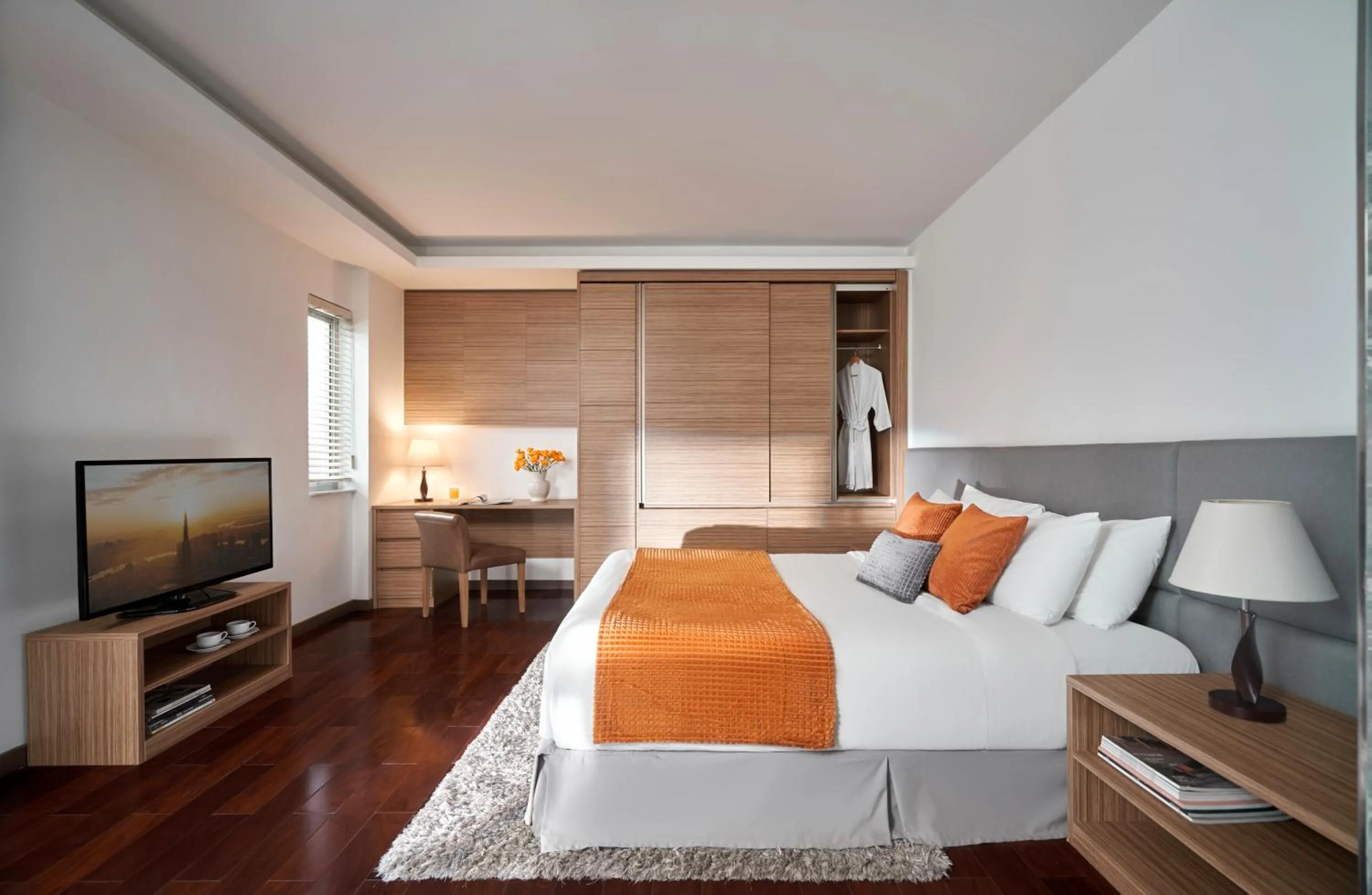 Photo of the whole room, Bed in Oakwood Hotel & Apartments Saigon