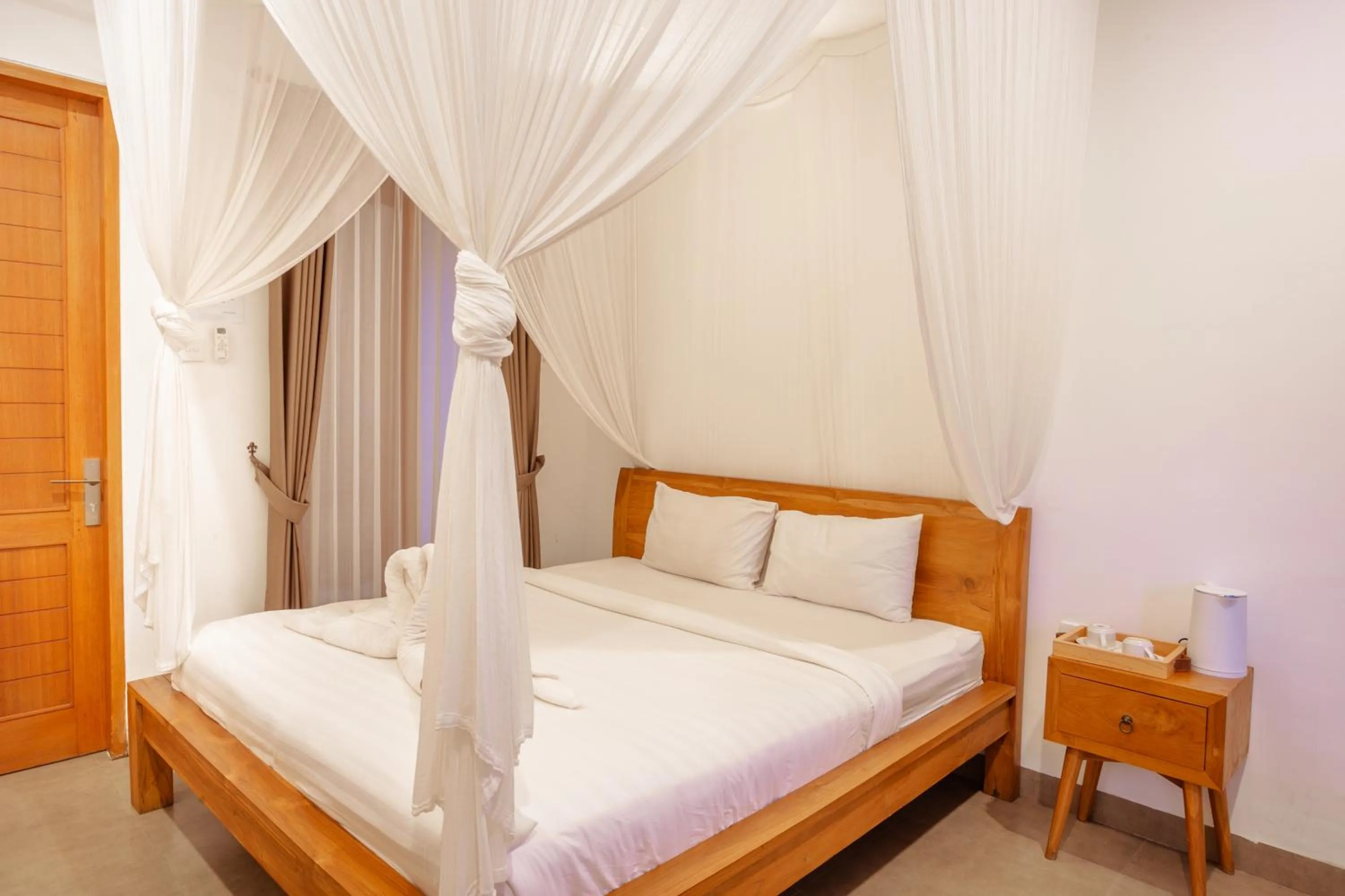 Bed in Kubu D'Carik Villa & Bungalow by ecommerceloka