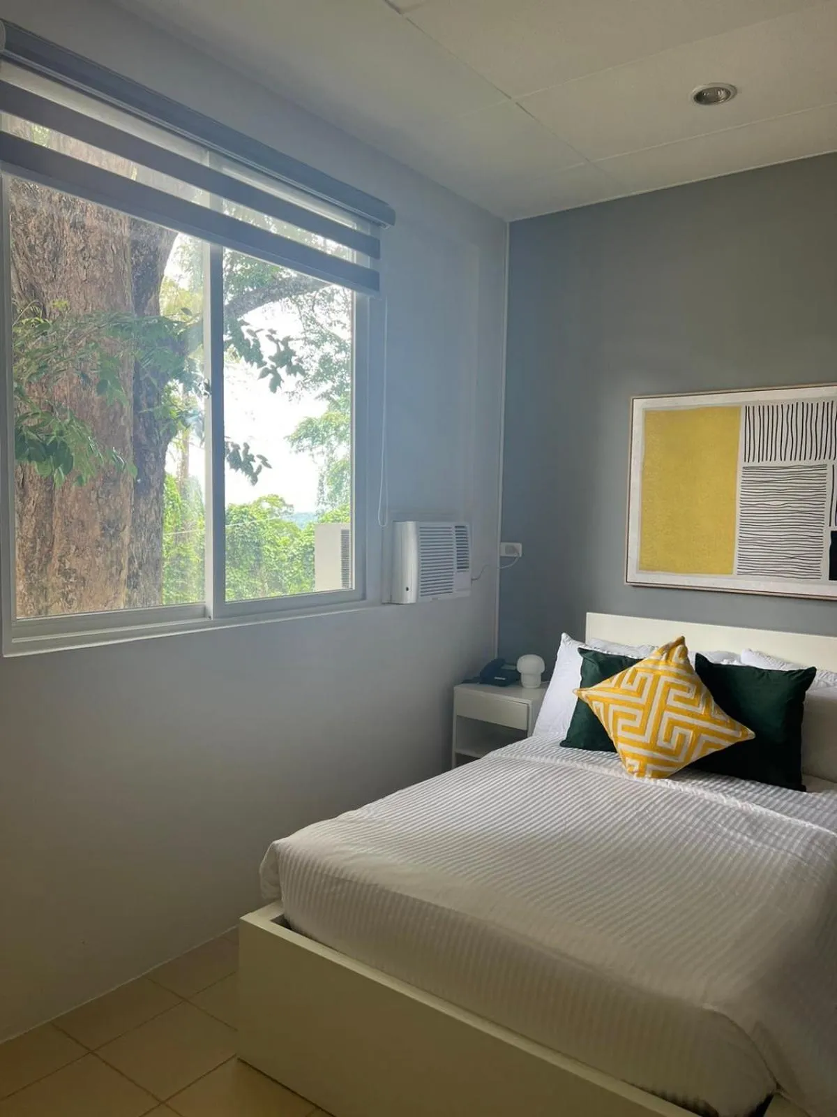 Bed in Emerald Manor Hotel