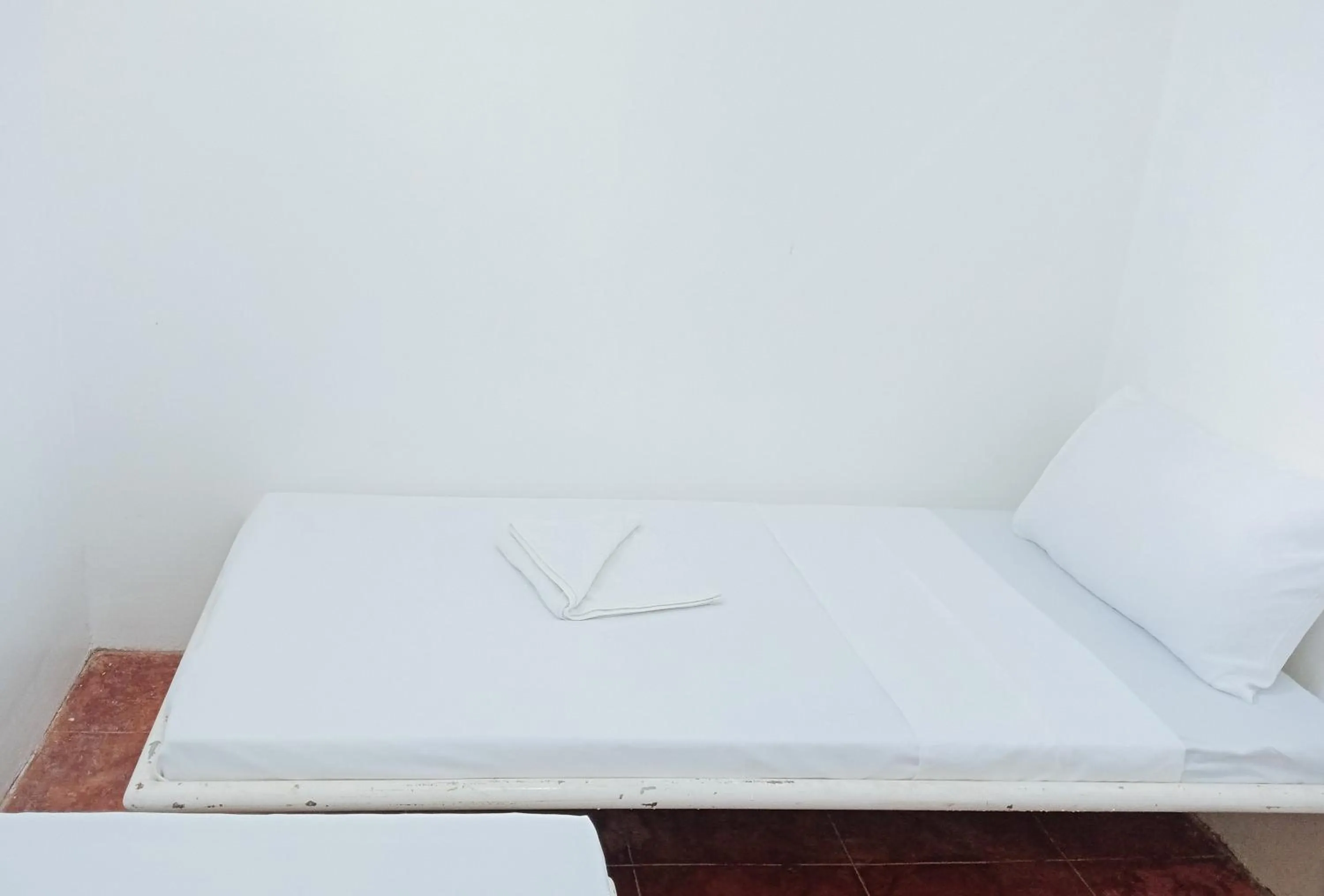 Bed in RedDoorz @ Southern Suites Guimaras