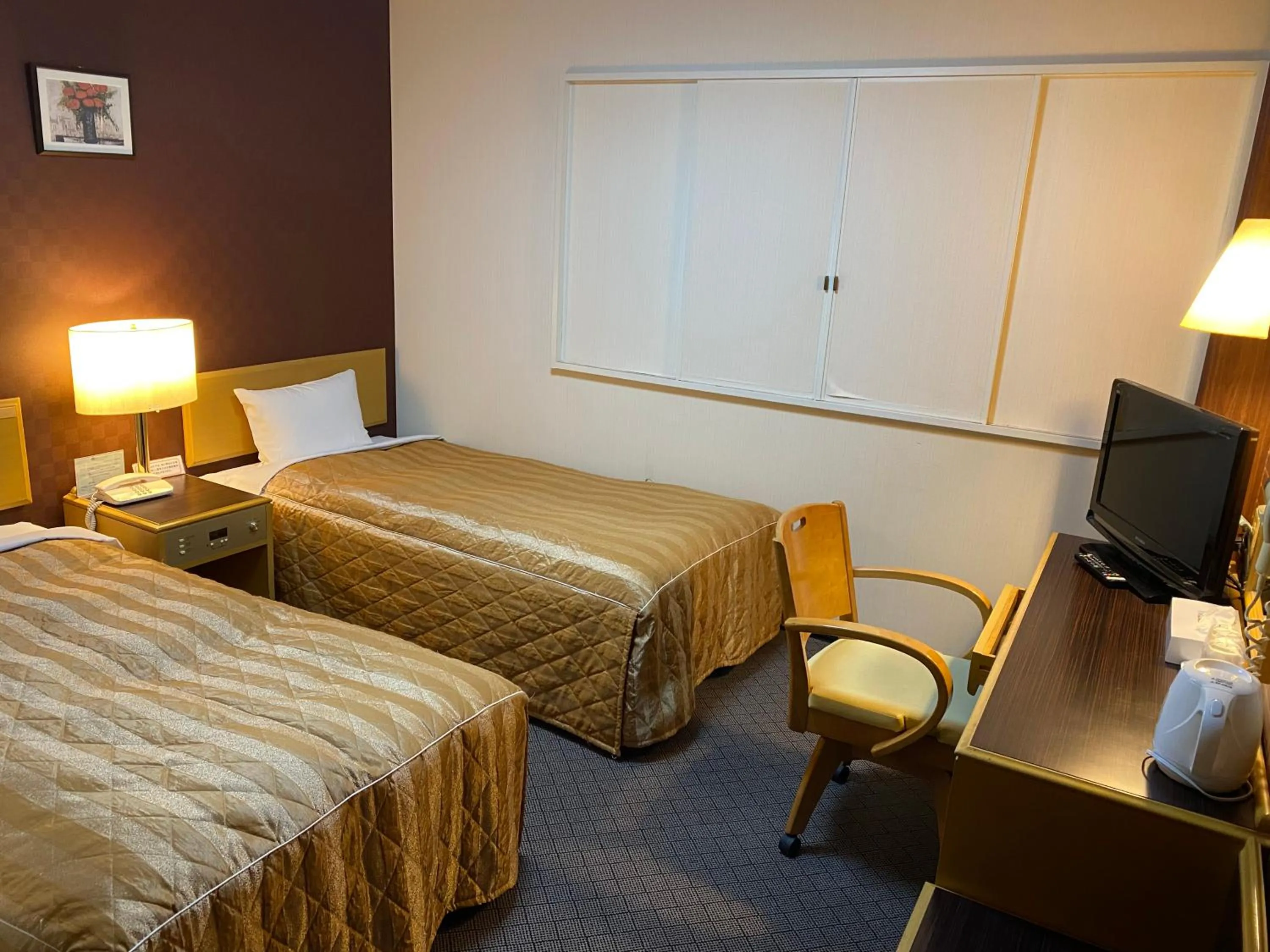 Photo of the whole room, Bed in Hotel Crown Hills Furukawa