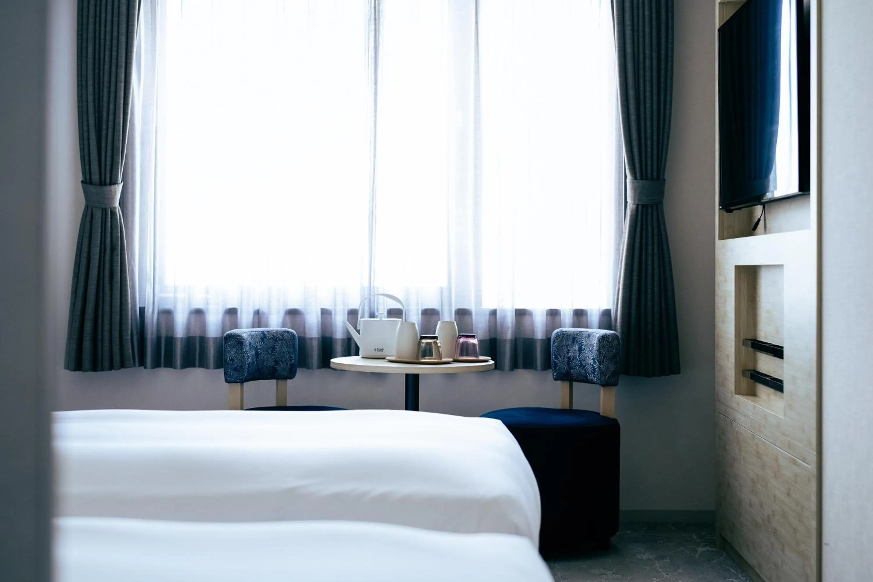 Bed in OMO3 Kyoto Toji by Hoshino Resorts