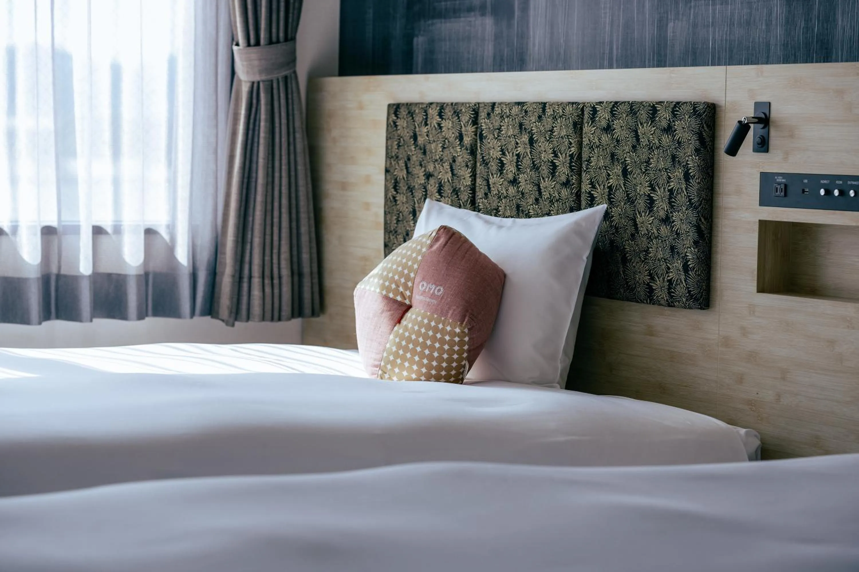 Bed in OMO3 Kyoto Toji by Hoshino Resorts