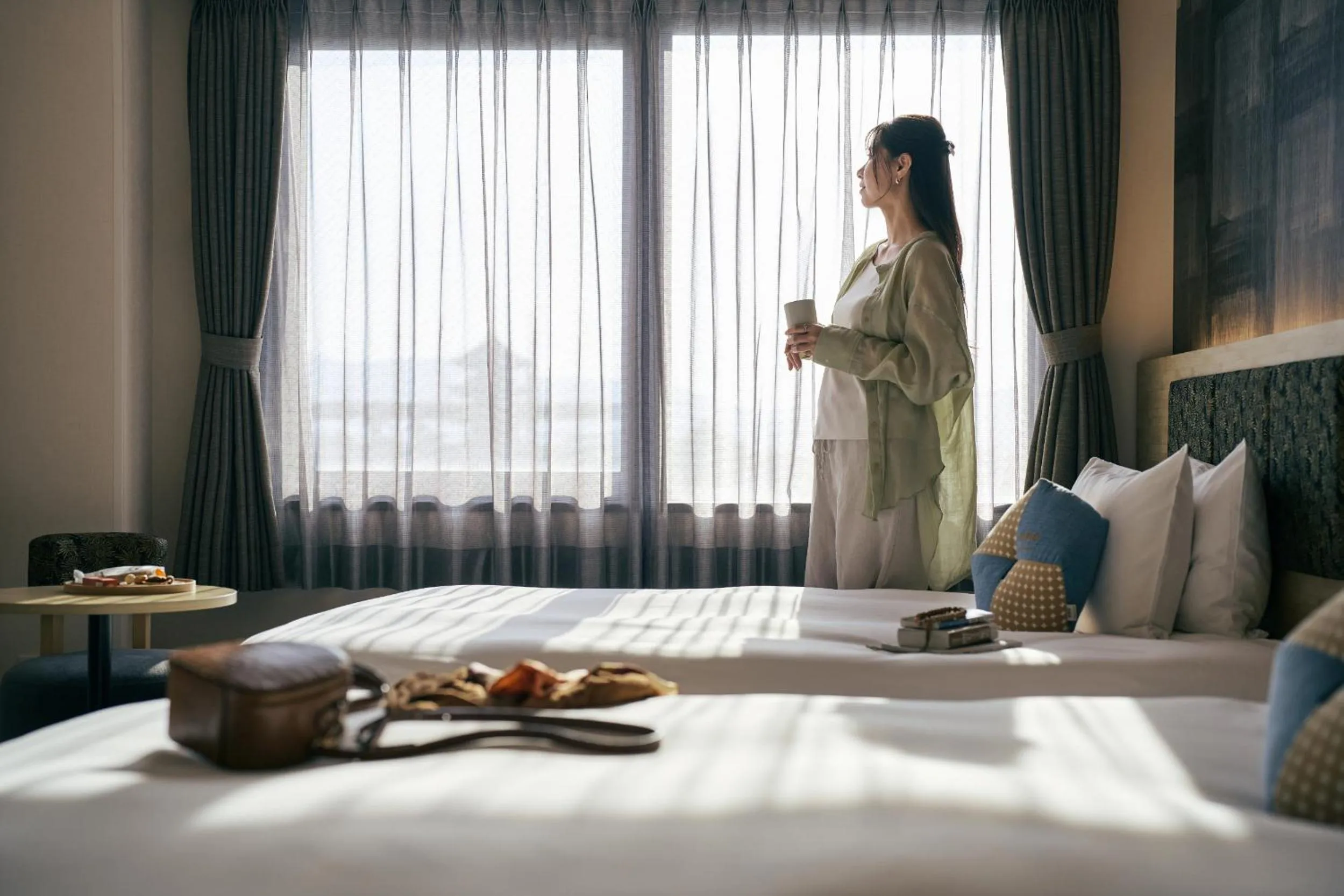 Bed in OMO3 Kyoto Toji by Hoshino Resorts