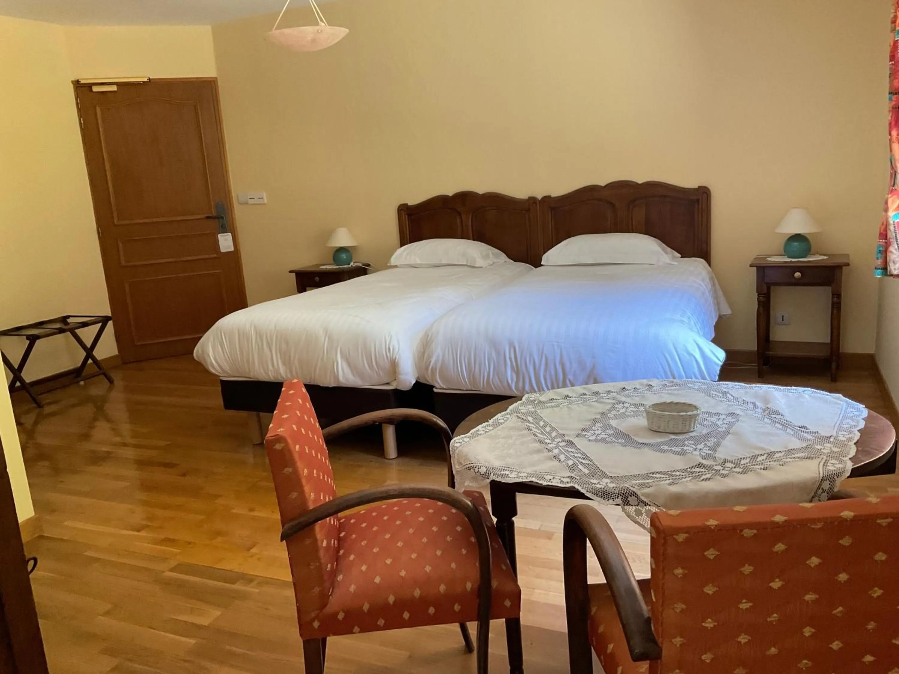 Photo of the whole room, Bed in A l oree du bois