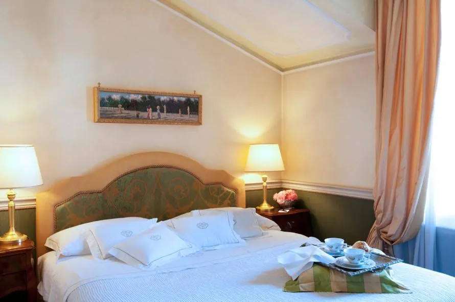 Photo of the whole room, Bed in Petit Palais Hotel De Charme