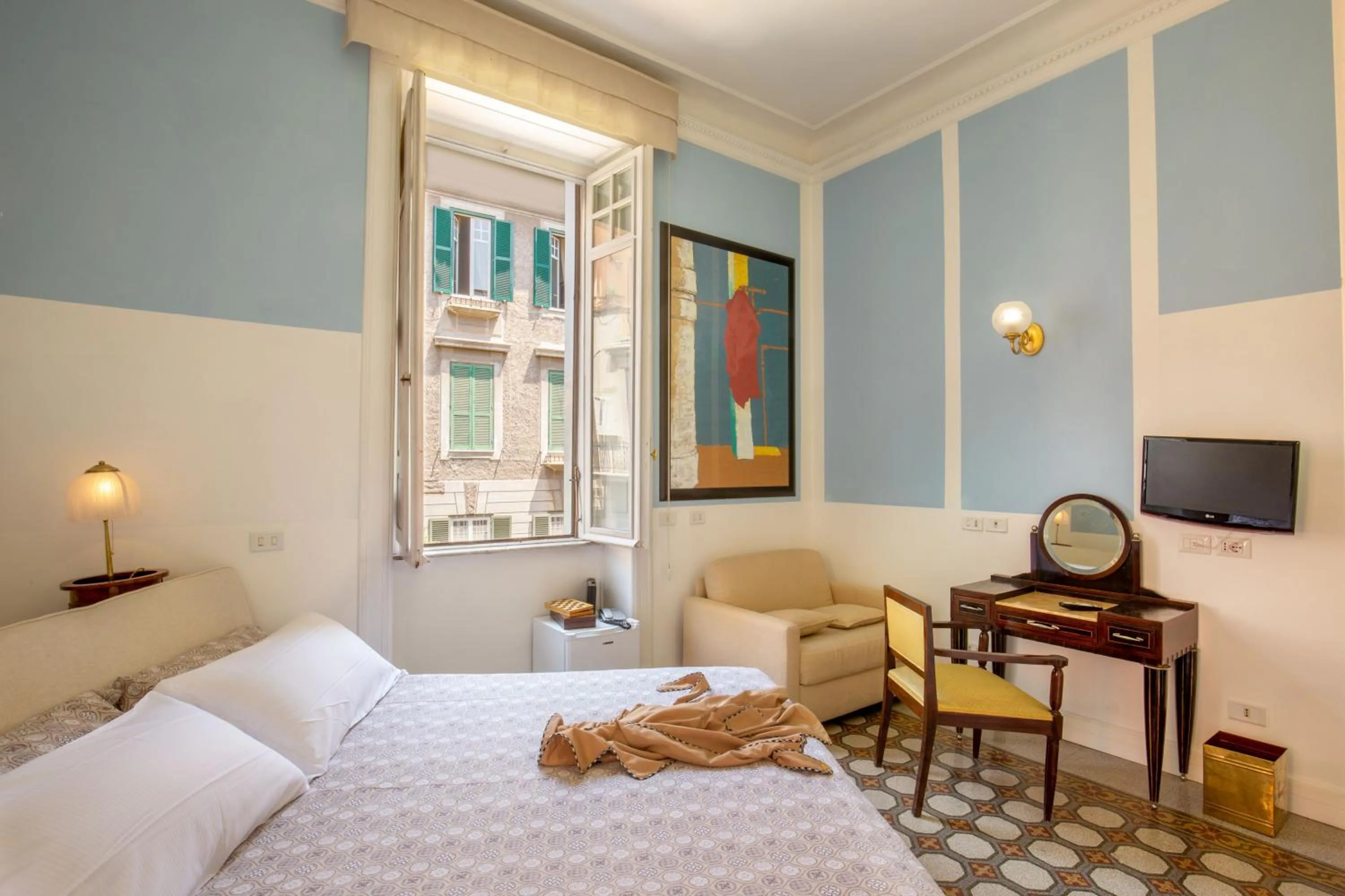 Bed in Hotel Emona Aquaeductus