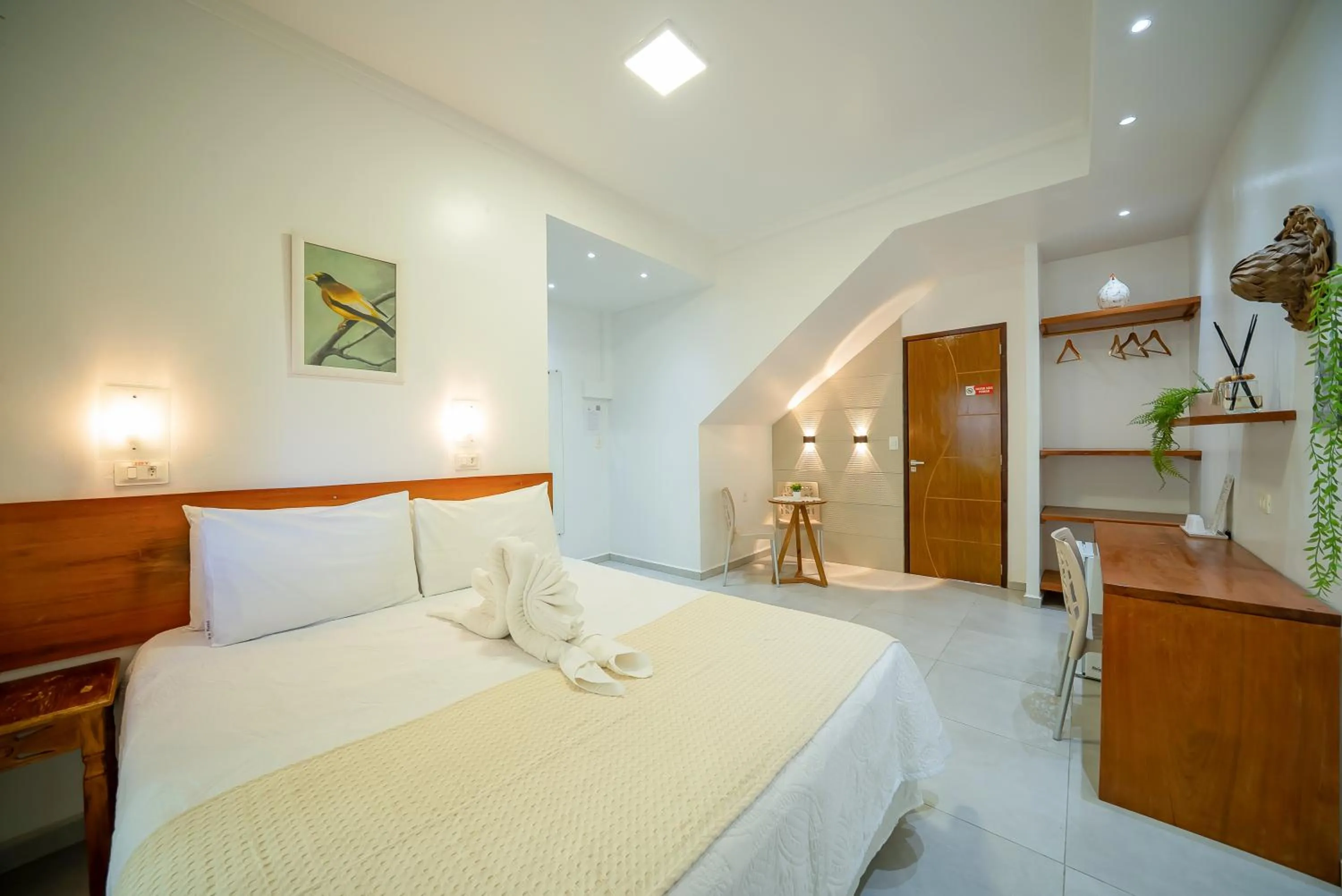 Bed in Pousada Som dos Pássaros