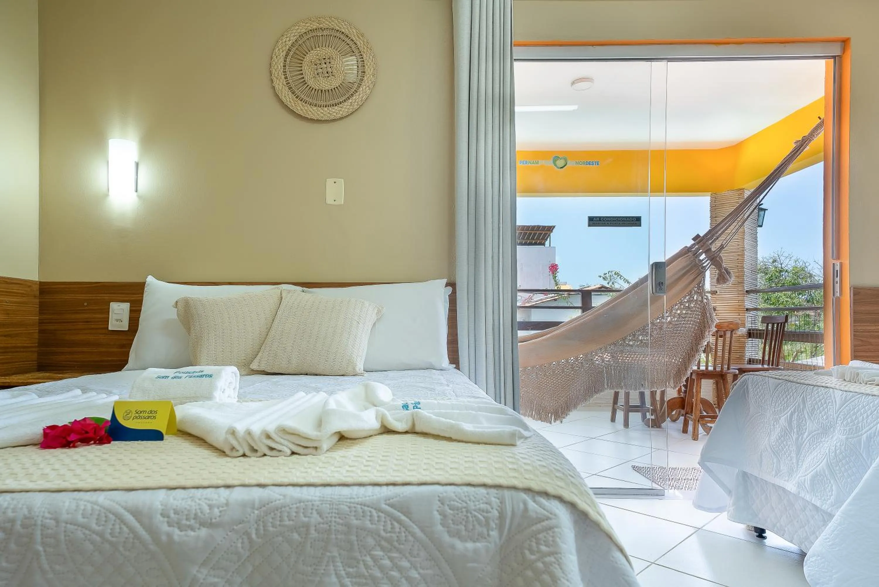 Bed in Pousada Som dos Pássaros