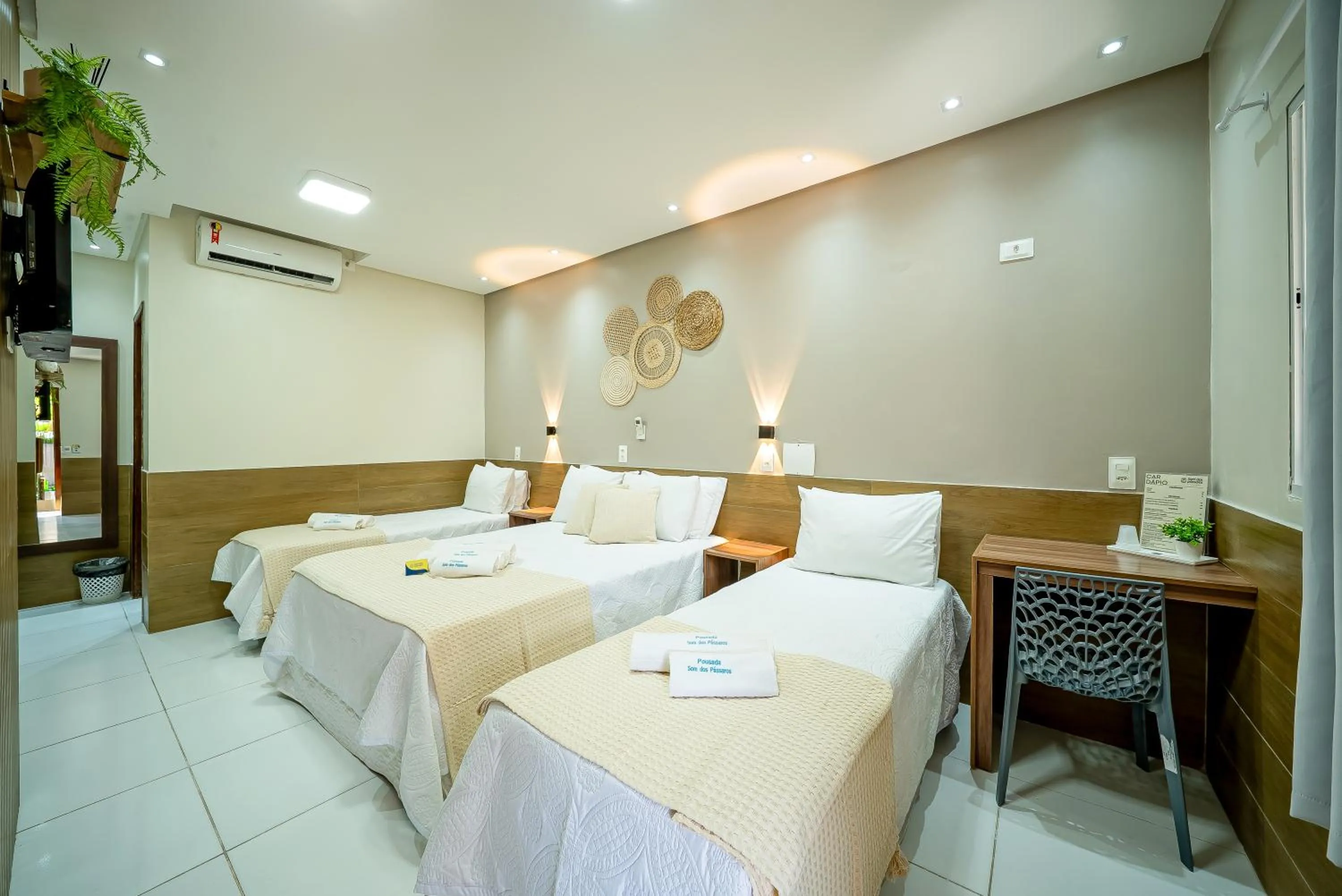 Bed in Pousada Som dos Pássaros