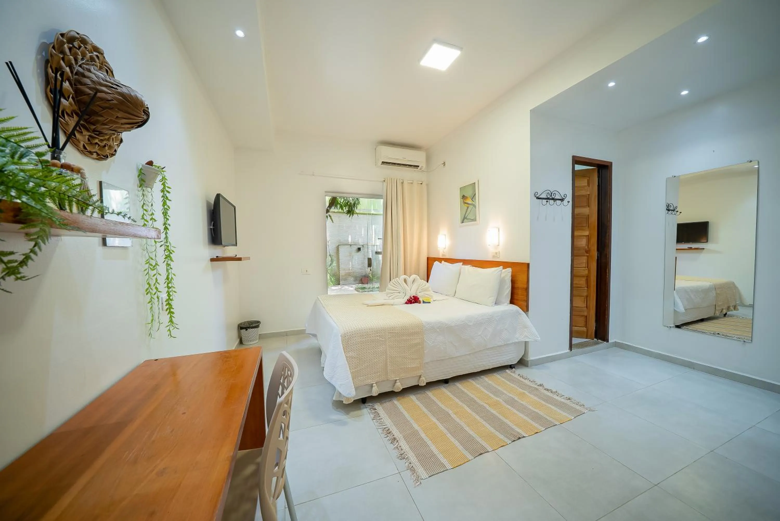 Bed in Pousada Som dos Pássaros