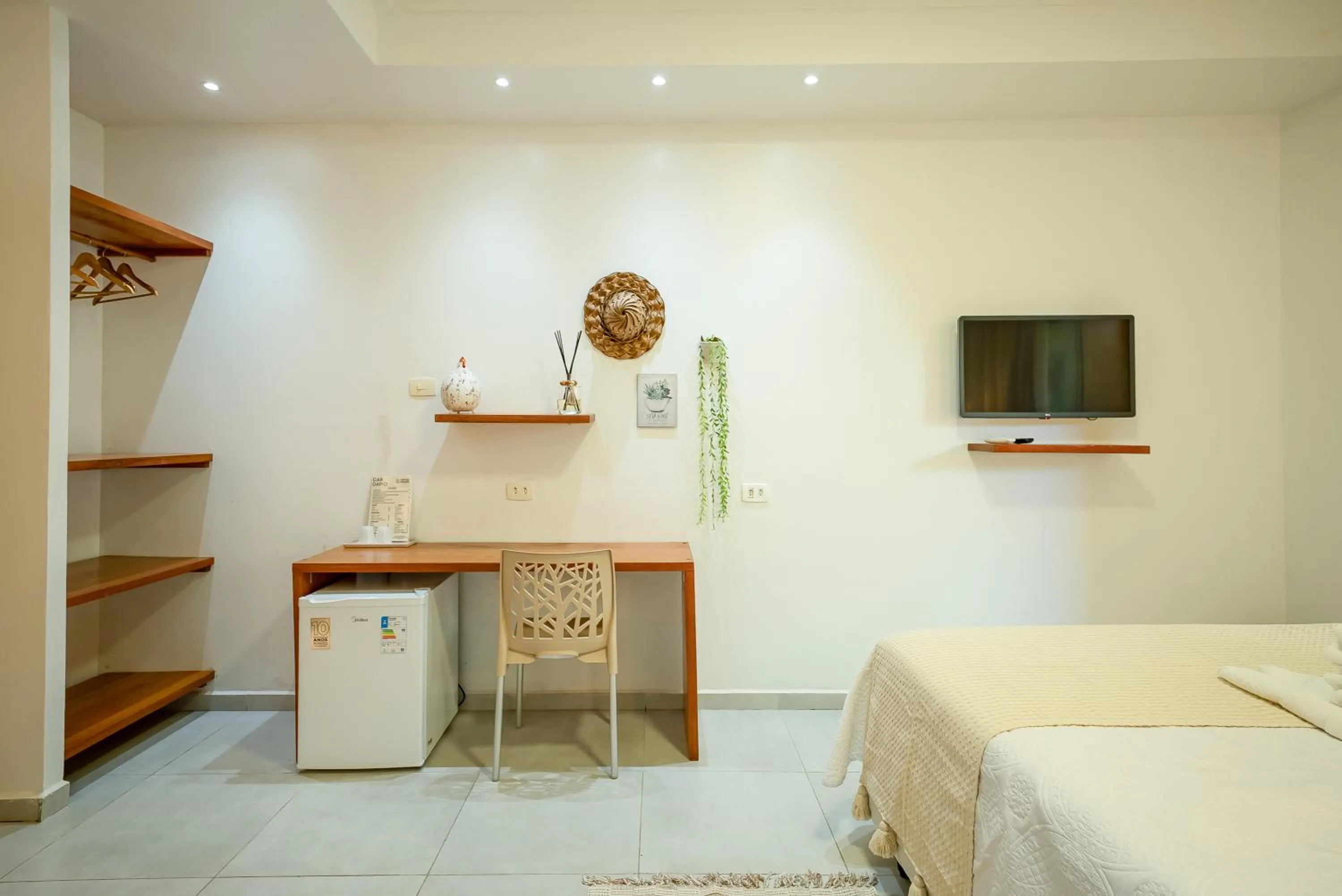 Bed in Pousada Som dos Pássaros