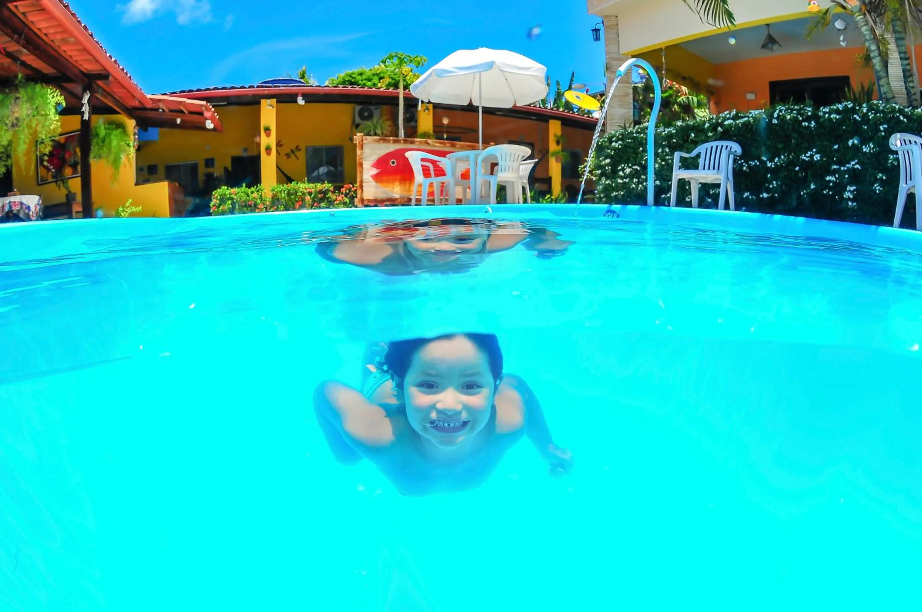 Pool view in Pousada Som dos Pássaros